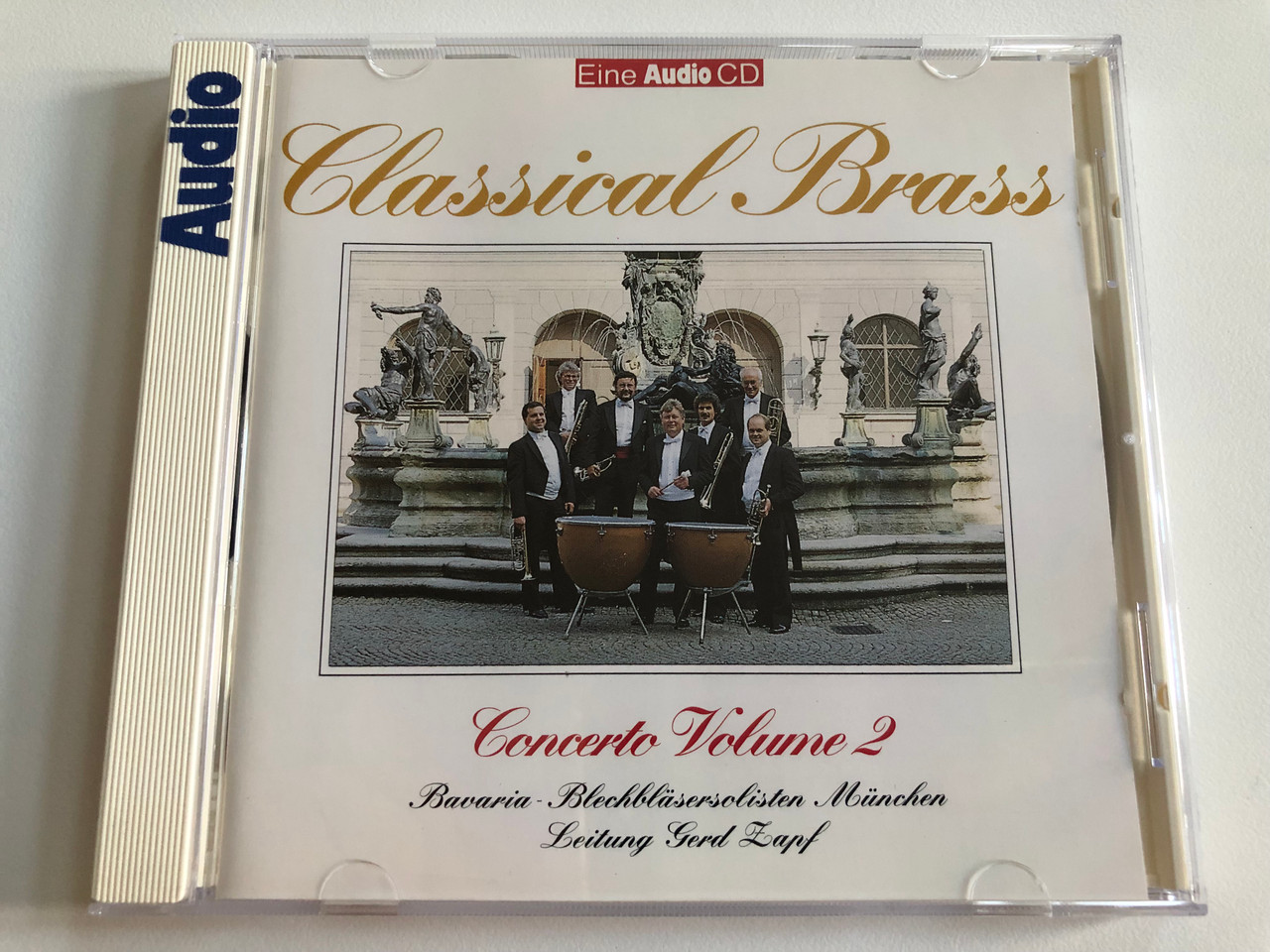 https://cdn10.bigcommerce.com/s-62bdpkt7pb/products/0/images/188433/Classical_Brass_-_Concerto_Volume_2_-_Bavaria_Blechblasersolisten_Munchen_Leitung_Gerd_Lapf_Phono_Music_Audio_CD_1992_27000466_A_1__60454.1629471895.1280.1280.JPG?c=2&_gl=1*1rk9ddv*_ga*MjA2NTIxMjE2MC4xNTkwNTEyNTMy*_ga_WS2VZYPC6G*MTYyOTQ2MzgxOC40MC4xLjE2Mjk0NzE5MzIuNjA.