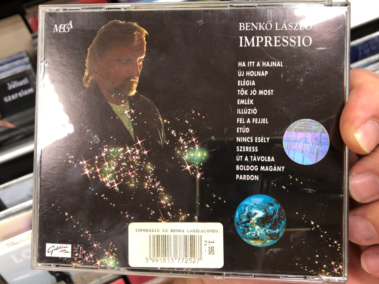 https://cdn10.bigcommerce.com/s-62bdpkt7pb/products/0/images/188470/Impressio_-_Benk_Lszl_Mega_Audio_CD_HCD_37725_94M-126_2__63248.1629476160.1280.1280.JPG?c=2&_gl=1*14ishcm*_ga*MjA2NTIxMjE2MC4xNTkwNTEyNTMy*_ga_WS2VZYPC6G*MTYyOTQ2MzgxOC40MC4xLjE2Mjk0NzYyMTUuNjA.
