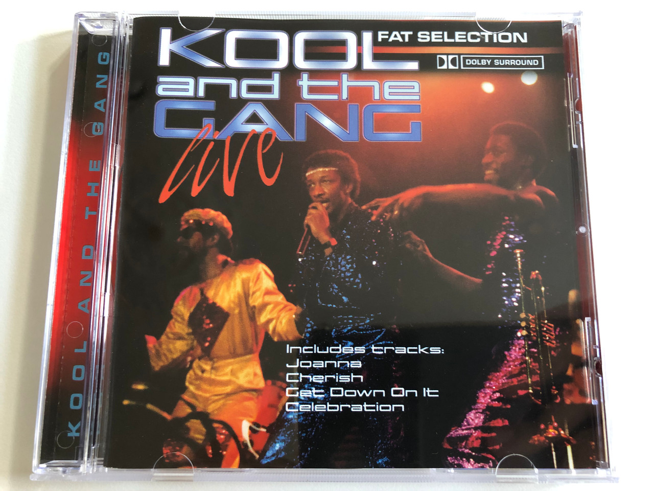 https://cdn10.bigcommerce.com/s-62bdpkt7pb/products/0/images/188496/Kool_And_The_Gang_Live_Includes_tracks_Joanna_Cherish_Get_Down_On_It_Celebration_Going_For_A_Song_Audio_CD_GFS067_1__45156.1629480661.1280.1280.JPG?c=2&_gl=1*1bakazc*_ga*MjA2NTIxMjE2MC4xNTkwNTEyNTMy*_ga_WS2VZYPC6G*MTYyOTQ2MzgxOC40MC4xLjE2Mjk0ODA1MDkuMTk.