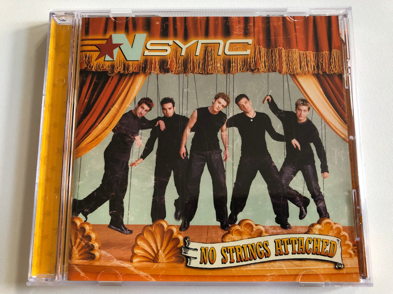 https://cdn10.bigcommerce.com/s-62bdpkt7pb/products/0/images/188522/NSYNC_No_Strings_Attached_Jive_Audio_CD_2000_724384922023_1__61486.1629481648.1280.1280.JPG?c=2&_gl=1*1wh9ozc*_ga*MjA2NTIxMjE2MC4xNTkwNTEyNTMy*_ga_WS2VZYPC6G*MTYyOTQ2MzgxOC40MC4xLjE2Mjk0ODE1MTQuMzk.