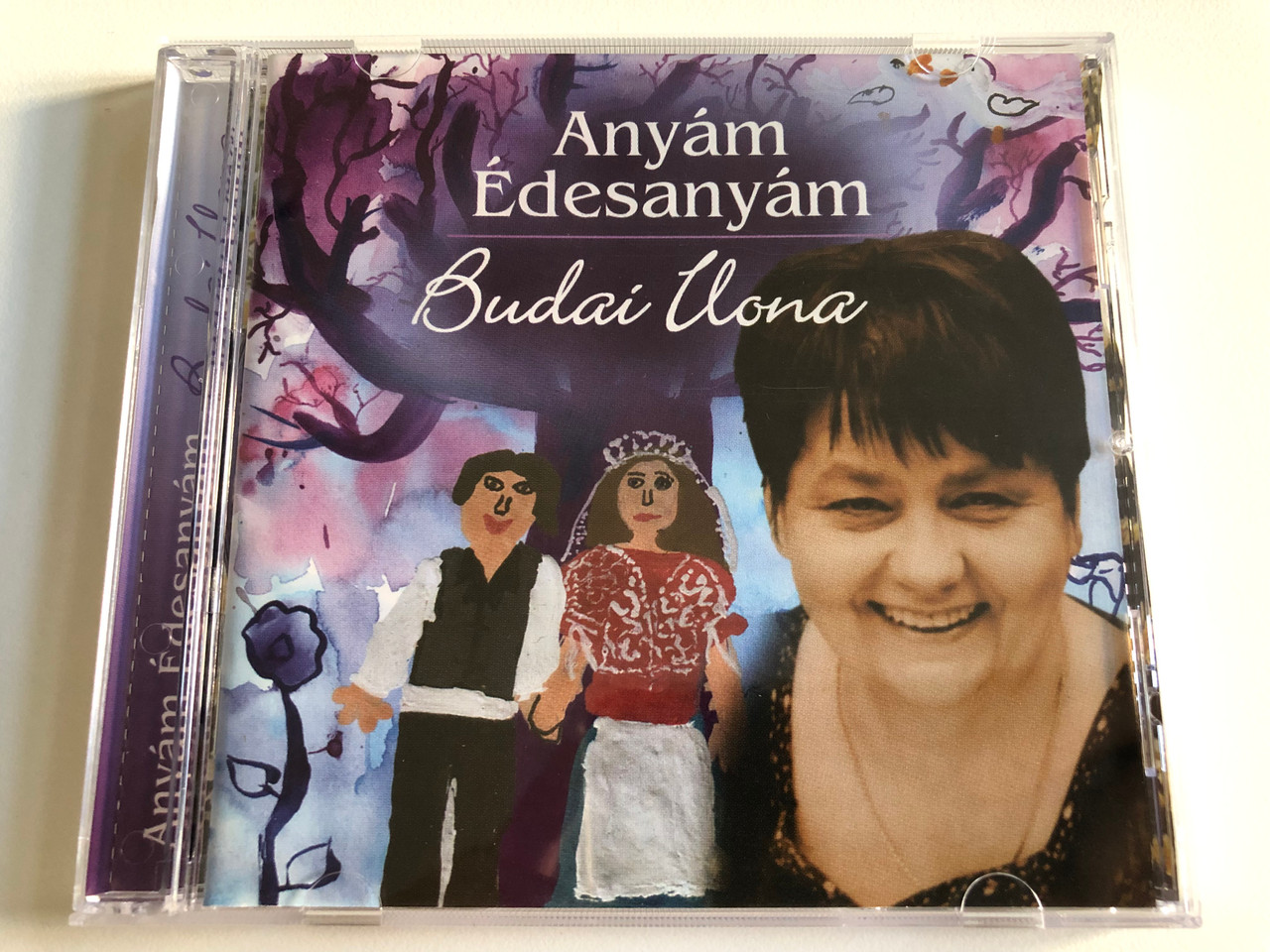 https://cdn10.bigcommerce.com/s-62bdpkt7pb/products/0/images/188708/Anym_desanym_-_Budai_Ilona_G_G_Gasztokt_Bt._Audio_CD_2004_BZS-04_1__32498.1629711318.1280.1280.JPG?c=2&_gl=1*3rccf2*_ga*MjA2NTIxMjE2MC4xNTkwNTEyNTMy*_ga_WS2VZYPC6G*MTYyOTY5NzY5MS40MS4xLjE2Mjk3MTEyMjEuNTg.