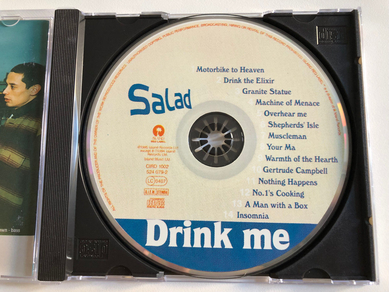 https://cdn10.bigcommerce.com/s-62bdpkt7pb/products/0/images/188723/Salad_Drink_Me_Island_Red_Label_Audio_CD_1995_CIRD_1002_3__72694.1629712222.1280.1280.JPG?c=2&_gl=1*18hb0qp*_ga*MjA2NTIxMjE2MC4xNTkwNTEyNTMy*_ga_WS2VZYPC6G*MTYyOTY5NzY5MS40MS4xLjE2Mjk3MTIwNjMuMzY.