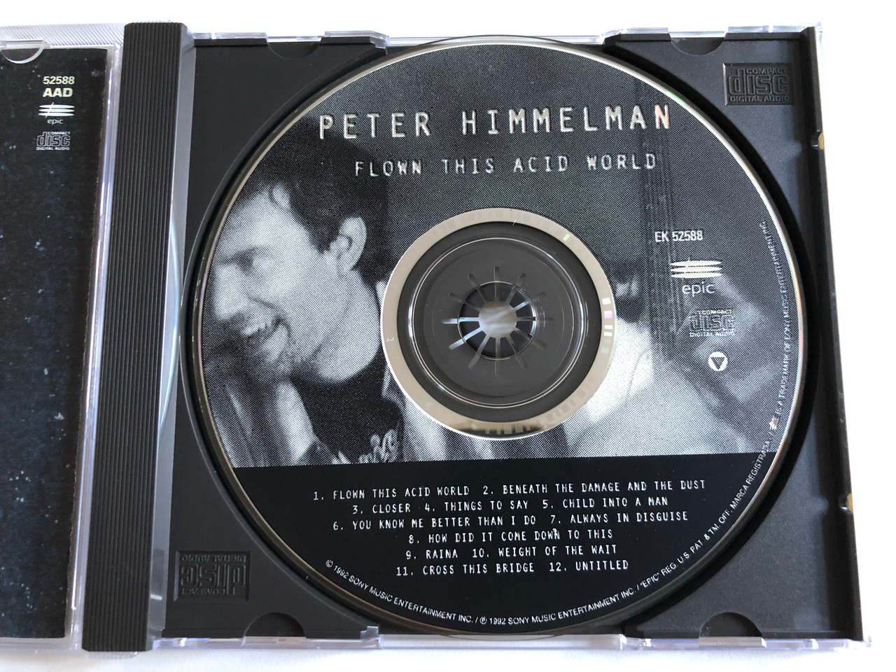 https://cdn10.bigcommerce.com/s-62bdpkt7pb/products/0/images/188760/Peter_Himmelman_Flown_This_Acid_World_Epic_Audio_CD_1992_EK_52588_3__62572.1629786861.1280.1280.JPG?c=2&_gl=1*1f98sku*_ga*MjA2NTIxMjE2MC4xNTkwNTEyNTMy*_ga_WS2VZYPC6G*MTYyOTc4NDA0NC40Mi4xLjE2Mjk3ODY5ODkuNjA.
