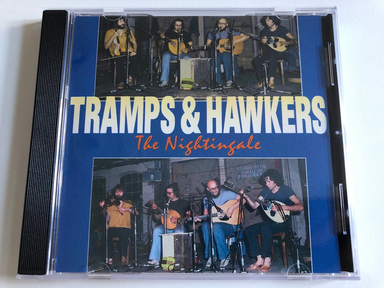 https://cdn10.bigcommerce.com/s-62bdpkt7pb/products/0/images/188764/Tramps_Hawkers_-_The_Nightingale_Pastels_Audio_CD_1995_CD_20_1__93299.1629787629.1280.1280.JPG?c=2&_gl=1*1c3j6yv*_ga*MjA2NTIxMjE2MC4xNTkwNTEyNTMy*_ga_WS2VZYPC6G*MTYyOTc4NDA0NC40Mi4xLjE2Mjk3ODc2NzQuNjA.