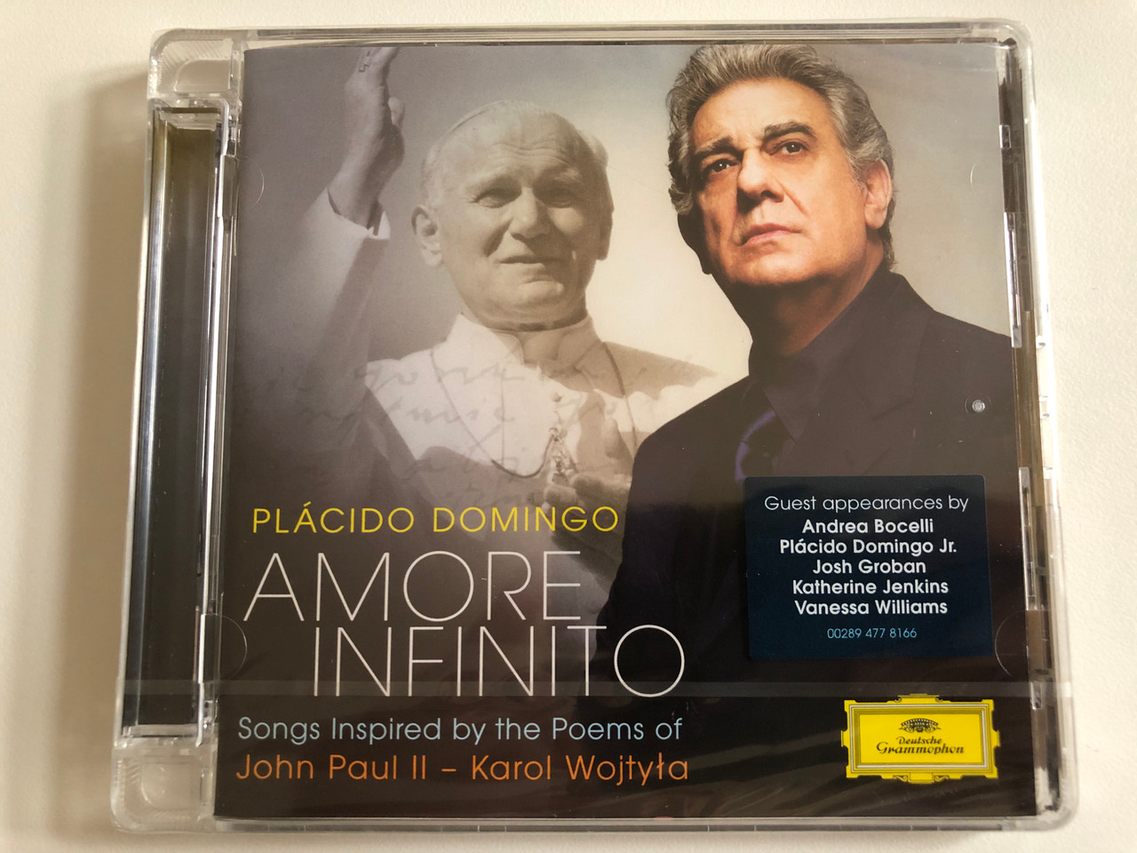 https://cdn10.bigcommerce.com/s-62bdpkt7pb/products/0/images/188783/Plcido_Domingo_Amore_Infinito_-_Songs_Inspired_By_The_Poems_Of_John_Paul_II_-_Karol_Wojtya_Guest_appearances_by_Andrea_Bocelli_Placido_Domingo_Jr._Josh_Groban_Katherine_Jenkins_Deutsche_1__68796.1629790382.1280.1280.JPG?c=2&_gl=1*1pbmyq2*_ga*MjA2NTIxMjE2MC4xNTkwNTEyNTMy*_ga_WS2VZYPC6G*MTYyOTc4NDA0NC40Mi4xLjE2Mjk3OTA2MjYuNjA.