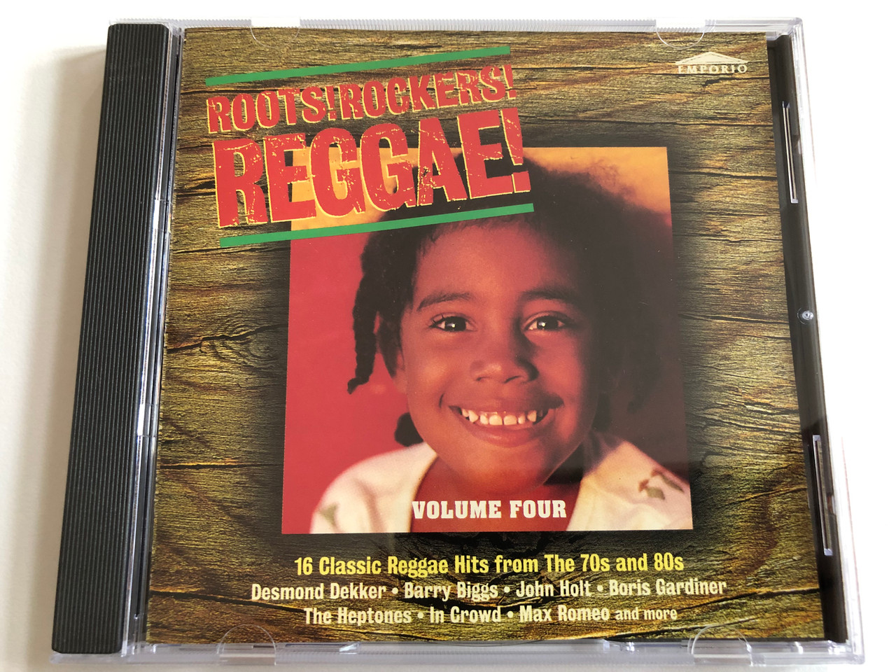 https://cdn10.bigcommerce.com/s-62bdpkt7pb/products/0/images/188984/Roots_Rockers_Reggae_-_Volume_Four_16_Classic_Raggae_Hits_from_The_70s_and_80s_-_Desmond_Dekker_Barry_Biggs_Johnny_Clarke_Boris_Gardiner_The_Heptones_In_Crowd_Max_Romeo_and_more_E_1__06134.1629879458.1280.1280.JPG?c=2&_gl=1*14znhr2*_ga*MjA2NTIxMjE2MC4xNTkwNTEyNTMy*_ga_WS2VZYPC6G*MTYyOTg2ODcyMC40NC4xLjE2Mjk4NzkyMDAuMTY.