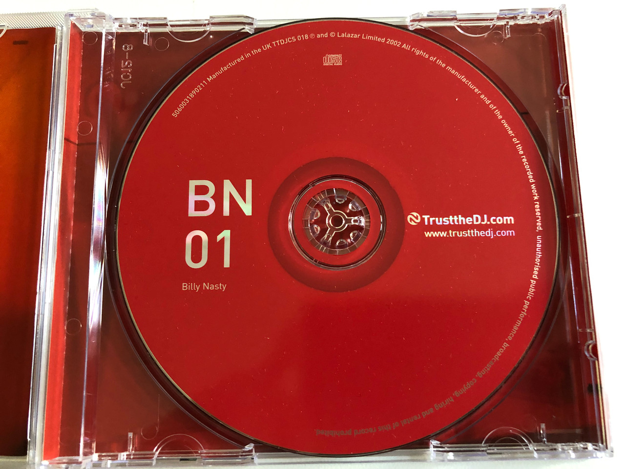 https://cdn10.bigcommerce.com/s-62bdpkt7pb/products/0/images/189358/BN01_-_Billy_Nasty_Trust_The_DJ_Audio_CD_2002_TTDJCS_018_3__92719.1630048120.1280.1280.JPG?c=2&_gl=1*5sdr71*_ga*MjA2NTIxMjE2MC4xNTkwNTEyNTMy*_ga_WS2VZYPC6G*MTYzMDA0MDQ4Mi40OC4xLjE2MzAwNDc3MTYuNDA.