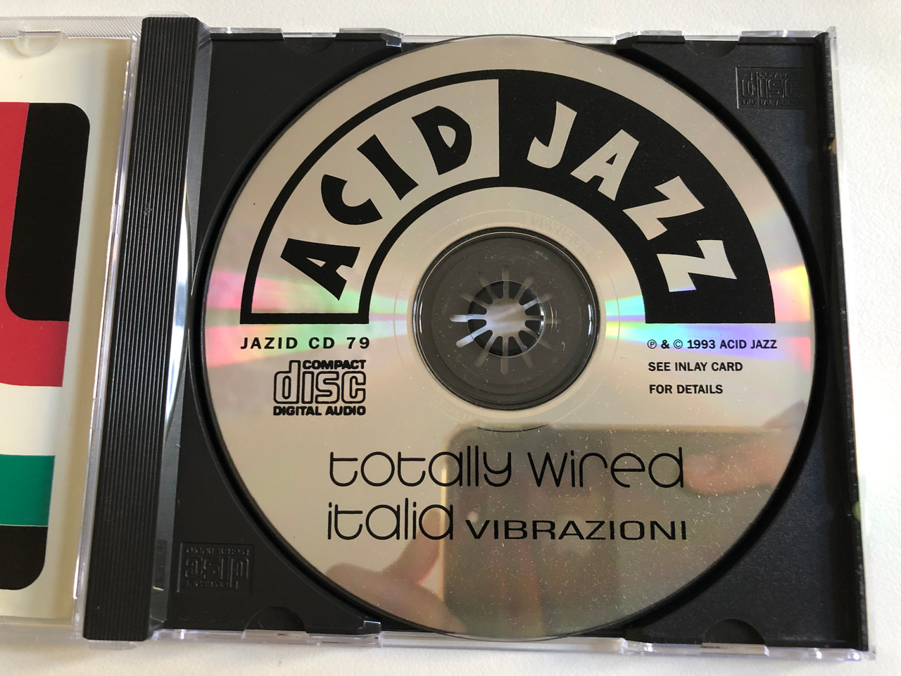 https://cdn10.bigcommerce.com/s-62bdpkt7pb/products/0/images/189479/Totally_Wired_Italia_Vibrazioni_Acid_Jazz_Audio_CD_1993_JAZID_79CD_3__32677.1630333045.1280.1280.JPG?c=2&_gl=1*1skcxog*_ga*MjA2NTIxMjE2MC4xNTkwNTEyNTMy*_ga_WS2VZYPC6G*MTYzMDMyOTQ4OS41MS4xLjE2MzAzMzI3NjguMzI.