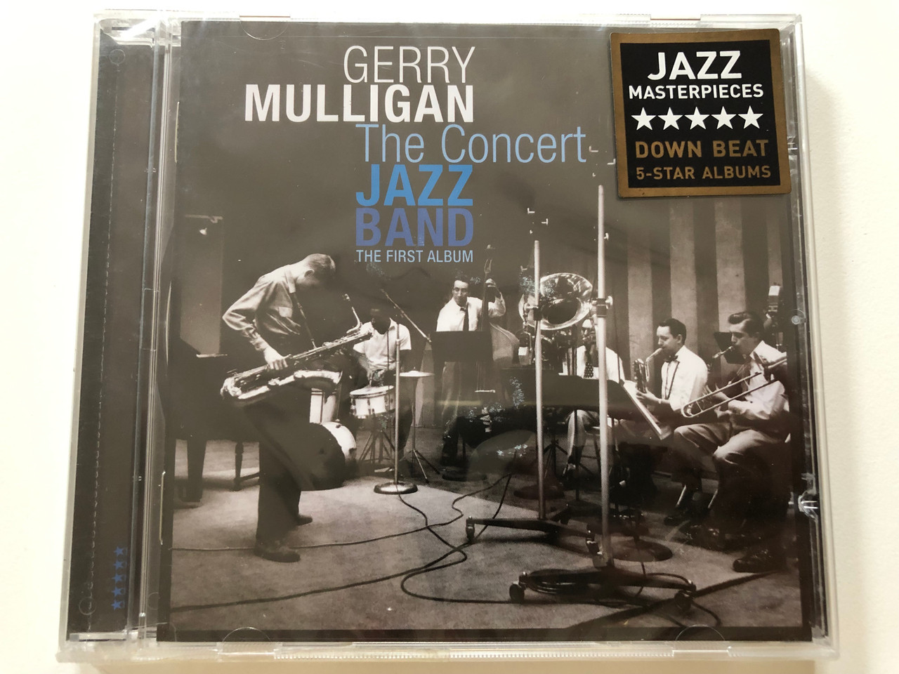 https://cdn10.bigcommerce.com/s-62bdpkt7pb/products/0/images/189550/Gerry_Mulligan_The_Concert_Jazz_Band_The_First_Album_Poll_Winners_Records_Audio_CD_2011_Stereo_PWR_27264_1__81491.1630348562.1280.1280.JPG?c=2&_gl=1*1j75c7c*_ga*MjA2NTIxMjE2MC4xNTkwNTEyNTMy*_ga_WS2VZYPC6G*MTYzMDM0MDk4MS41Mi4xLjE2MzAzNDg1NjkuNjA.