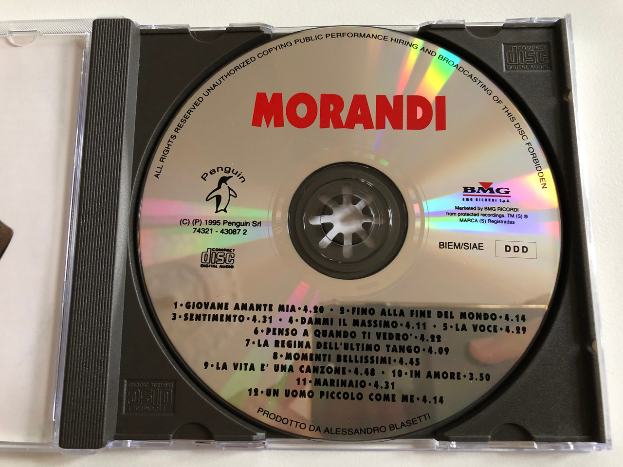 https://cdn10.bigcommerce.com/s-62bdpkt7pb/products/0/images/189571/Morandi_Contiene_Nuove_Versioni_Di_La_Regina_DellUltimo_Tango_Giovane_Amante_Mia_Sentimento_Penguin_Audio_CD_1996_74321430872_3__47822.1630350505.1280.1280.JPG?c=2&_gl=1*1eeiy7g*_ga*MjA2NTIxMjE2MC4xNTkwNTEyNTMy*_ga_WS2VZYPC6G*MTYzMDM0MDk4MS41Mi4xLjE2MzAzNTAzNDkuNDA.