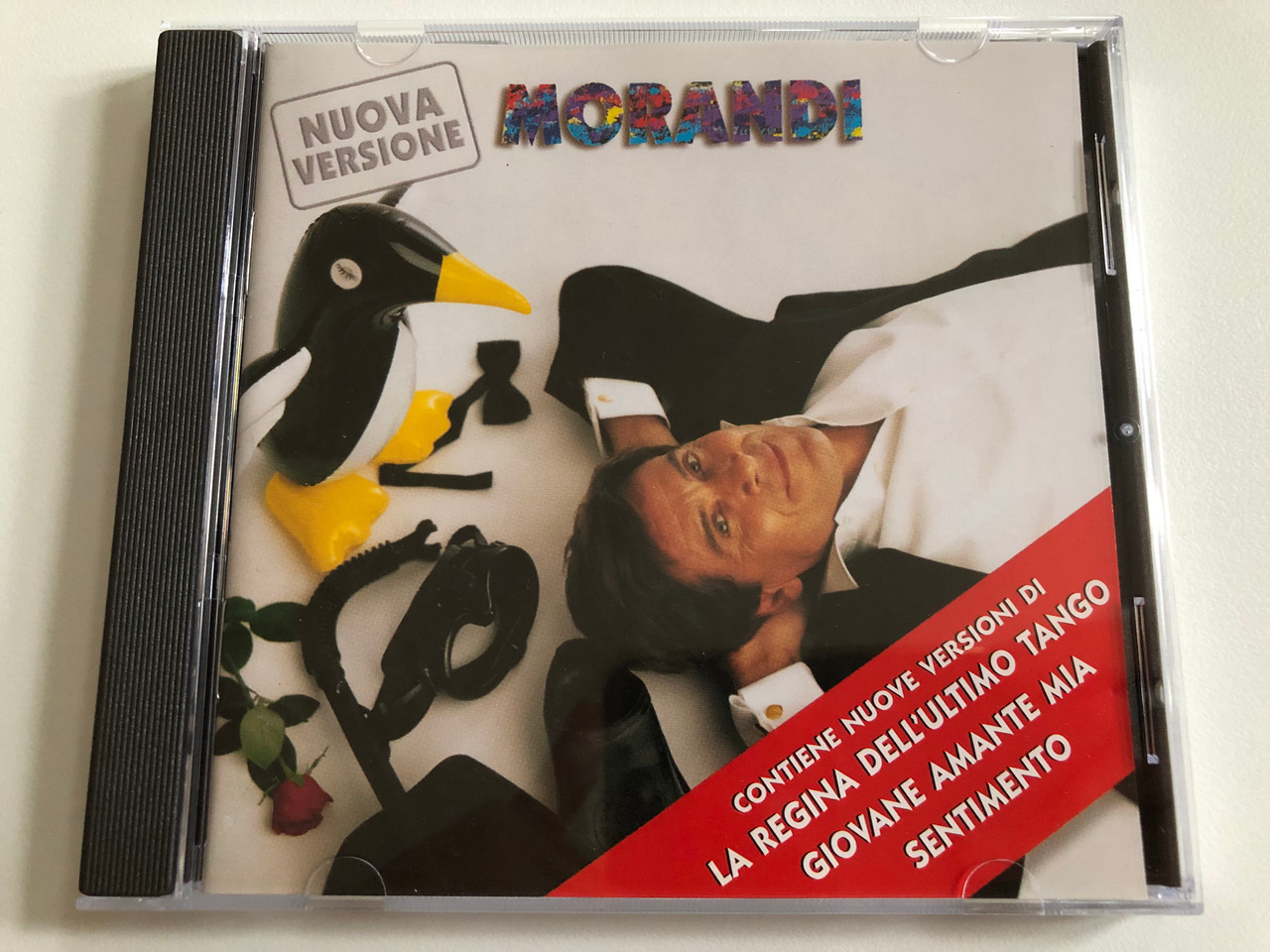 https://cdn10.bigcommerce.com/s-62bdpkt7pb/products/0/images/189573/Morandi_Contiene_Nuove_Versioni_Di_La_Regina_DellUltimo_Tango_Giovane_Amante_Mia_Sentimento_Penguin_Audio_CD_1996_74321430872_1__73120.1630350506.1280.1280.JPG?c=2&_gl=1*1eeiy7g*_ga*MjA2NTIxMjE2MC4xNTkwNTEyNTMy*_ga_WS2VZYPC6G*MTYzMDM0MDk4MS41Mi4xLjE2MzAzNTAzNDkuNDA.