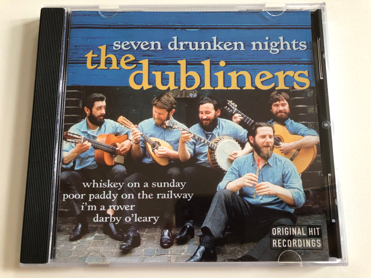 https://cdn10.bigcommerce.com/s-62bdpkt7pb/products/0/images/189578/Seven_Drunken_Nights_-_The_Dubliners_Whiskey_On_Sunday_Poor_Paddy_On_The_Railway_Im_A_Rover_Darby_OLeary_Wise_Buy_Audio_CD_1998_WB_885812_1__86655.1630350831.1280.1280.JPG?c=2&_gl=1*ol4lf5*_ga*MjA2NTIxMjE2MC4xNTkwNTEyNTMy*_ga_WS2VZYPC6G*MTYzMDM0MDk4MS41Mi4xLjE2MzAzNTA2NTEuMzY.