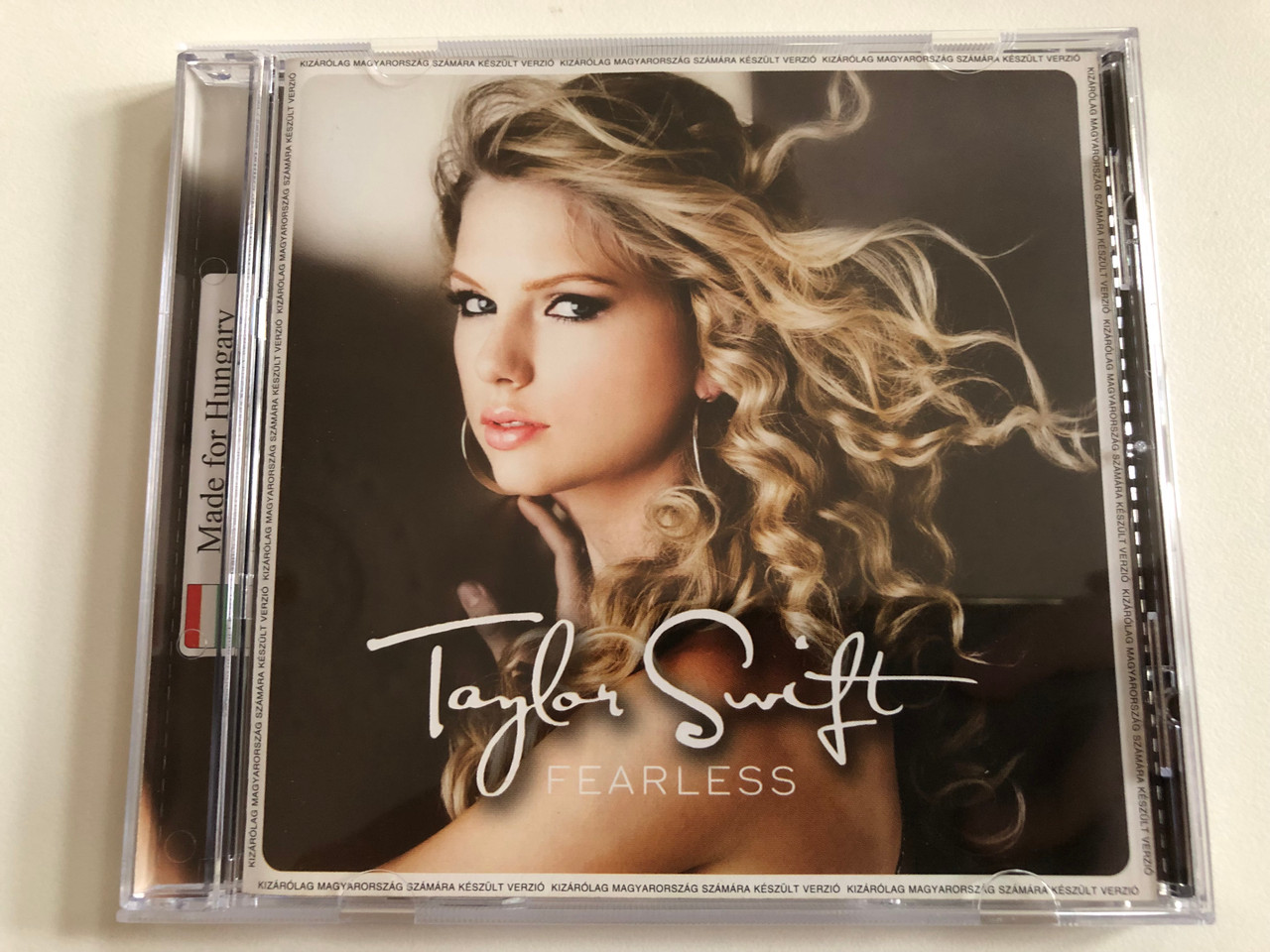 https://cdn10.bigcommerce.com/s-62bdpkt7pb/products/0/images/189710/Taylor_Swift_Fearless_Made_For_Hungary_Big_Machine_Records_Audio_CD_2009_060251798410383__92371.1630434458.1280.1280.JPG?c=2&_gl=1*mqg231*_ga*MjA2NTIxMjE2MC4xNTkwNTEyNTMy*_ga_WS2VZYPC6G*MTYzMDQyOTc5Mi41NC4xLjE2MzA0MzQyMzAuNTE.