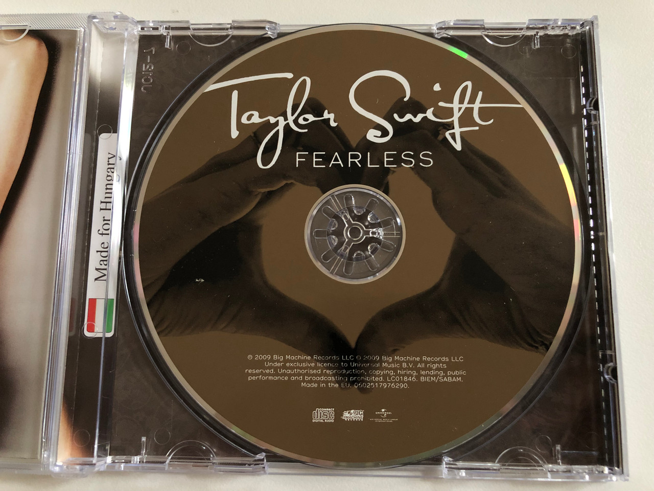 https://cdn10.bigcommerce.com/s-62bdpkt7pb/products/0/images/189712/Taylor_Swift_Fearless_Made_For_Hungary_Big_Machine_Records_Audio_CD_2009_060251798410385__56072.1630434460.1280.1280.JPG?c=2&_gl=1*mqg231*_ga*MjA2NTIxMjE2MC4xNTkwNTEyNTMy*_ga_WS2VZYPC6G*MTYzMDQyOTc5Mi41NC4xLjE2MzA0MzQyMzAuNTE.
