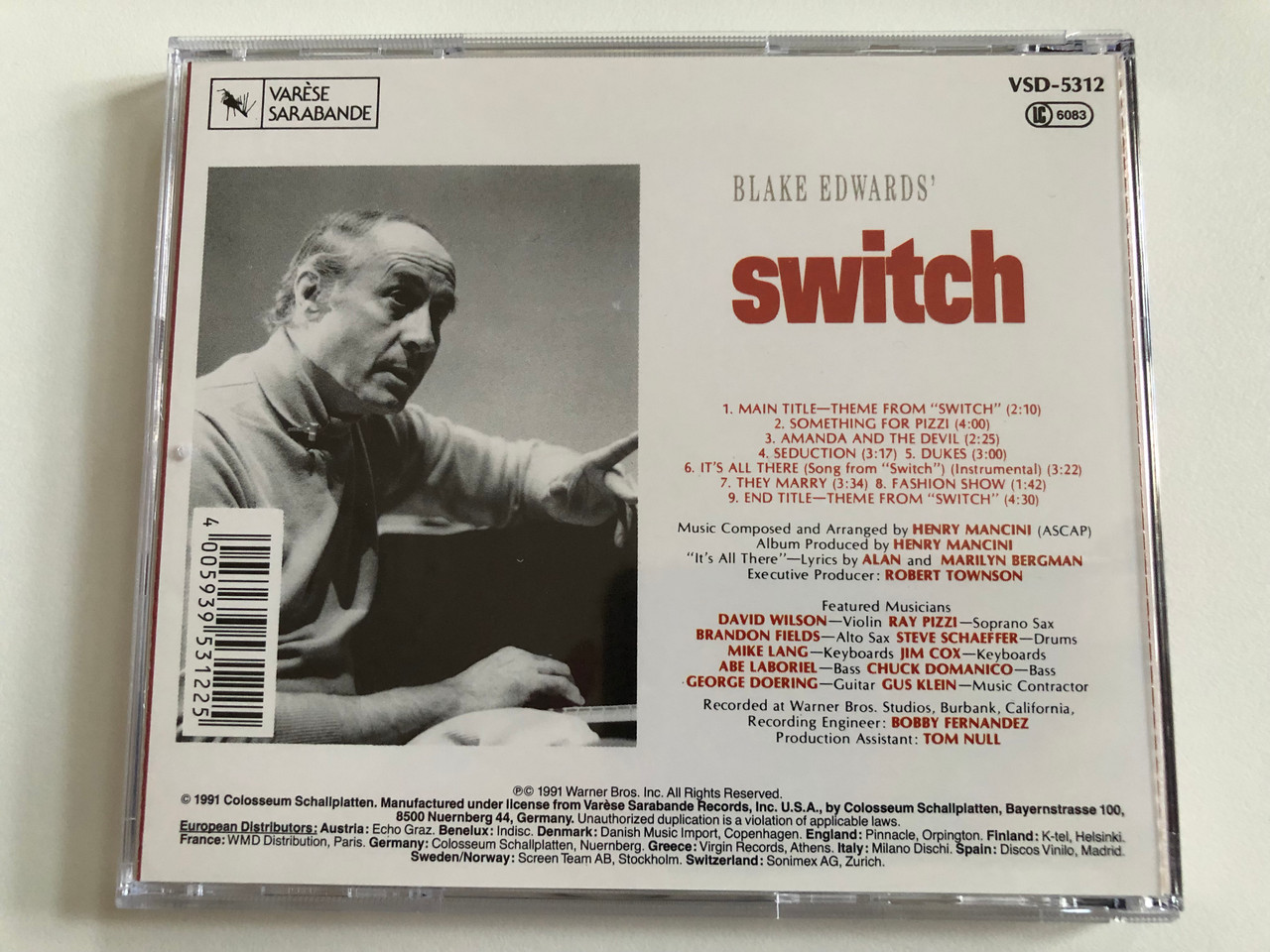 https://cdn10.bigcommerce.com/s-62bdpkt7pb/products/0/images/189756/Switch_Music_From_The_Film_Score_-_Music_Composed_And_Arranged_by_Henry_Mancini_Varse_Sarabande_Audio_CD_1991_VSD-5312_5__43487.1630438622.1280.1280.JPG?c=2&_gl=1*1hyg4y5*_ga*MjA2NTIxMjE2MC4xNTkwNTEyNTMy*_ga_WS2VZYPC6G*MTYzMDQyOTc5Mi41NC4xLjE2MzA0MzgyODAuMTc.