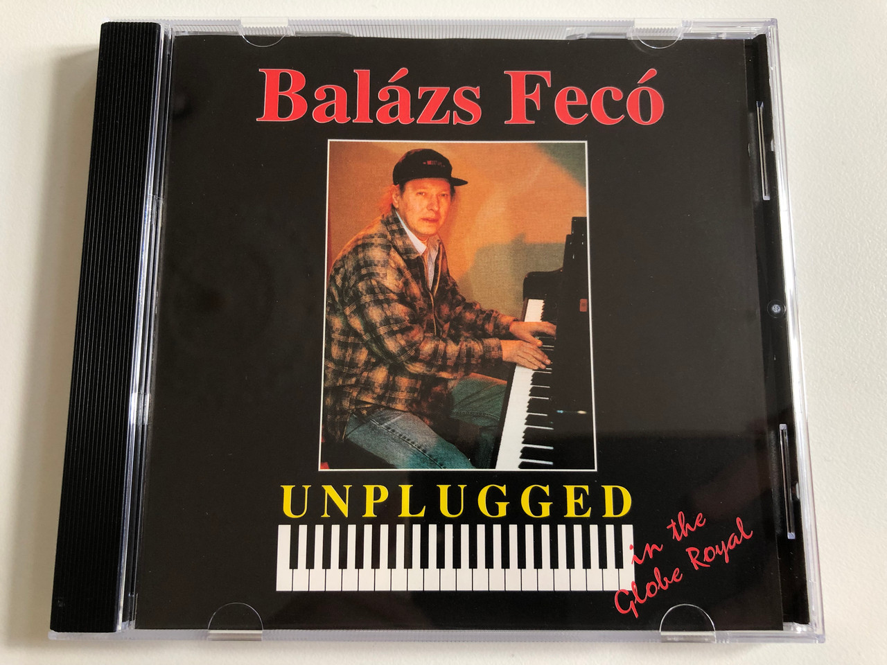 https://cdn10.bigcommerce.com/s-62bdpkt7pb/products/0/images/189983/Balzs_Fec_Unplugged_In_The_Globe_Royal_Magneoton_Audio_CD_1996_063014522-2_1__71929.1630602347.1280.1280.JPG?c=2&_gl=1*hl7im5*_ga*MjA2NTIxMjE2MC4xNTkwNTEyNTMy*_ga_WS2VZYPC6G*MTYzMDYwMTA5Mi41OS4xLjE2MzA2MDIyMTQuNTg.