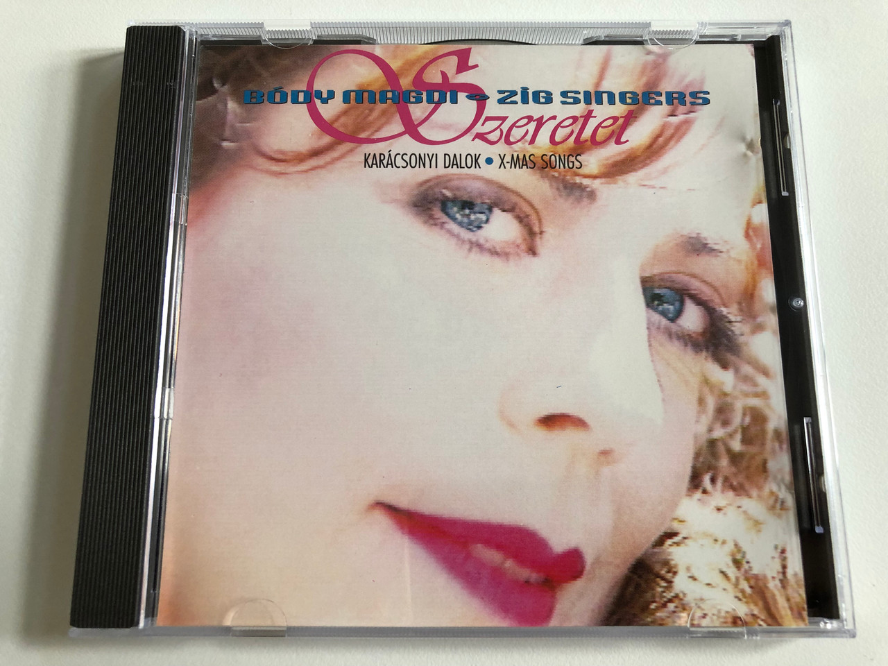 https://cdn10.bigcommerce.com/s-62bdpkt7pb/products/0/images/189988/Bdy_Magdi_Zig_Singers_Szeretet_-_Karcsonyi_Dalok_X-Mas_Songs_Mad_Music_Audio_CD_MM_1_1__89784.1630603274.1280.1280.JPG?c=2&_gl=1*1ojxczw*_ga*MjA2NTIxMjE2MC4xNTkwNTEyNTMy*_ga_WS2VZYPC6G*MTYzMDYwMTA5Mi41OS4xLjE2MzA2MDI1MTMuNDQ.