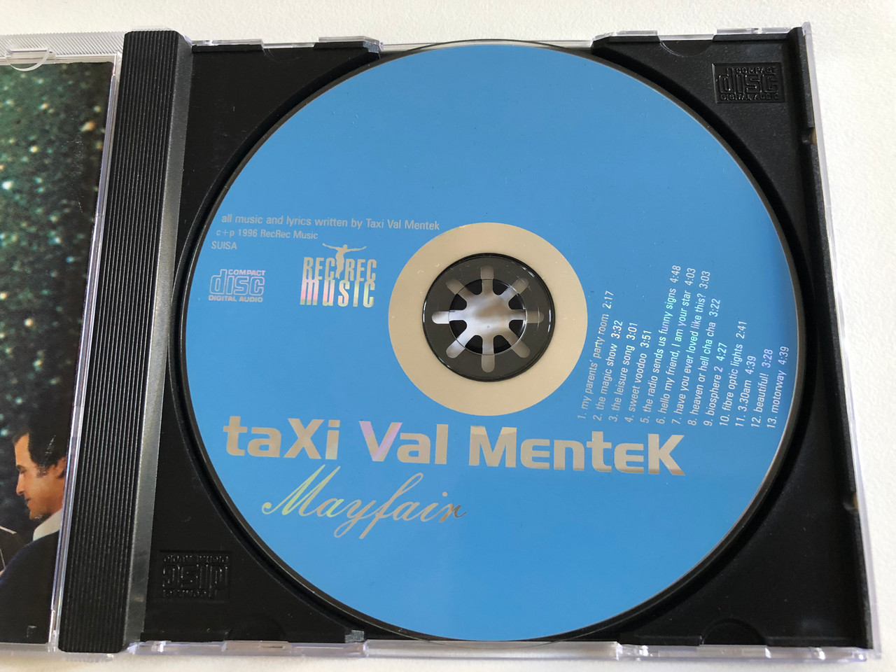 https://cdn10.bigcommerce.com/s-62bdpkt7pb/products/0/images/190043/Taxi_Val_Mentek_Mayfair_RecRec_Music_Audio_CD_1996_ReCDec_73_3__86224.1630609708.1280.1280.JPG?c=2&_gl=1*1h50fsg*_ga*MjA2NTIxMjE2MC4xNTkwNTEyNTMy*_ga_WS2VZYPC6G*MTYzMDYwMTA5Mi41OS4xLjE2MzA2MDk1ODYuMjY.