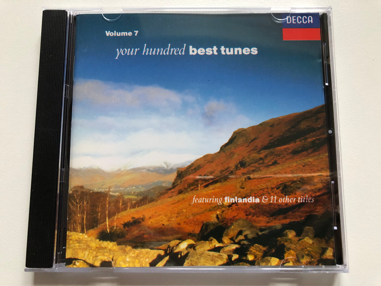 https://cdn10.bigcommerce.com/s-62bdpkt7pb/products/0/images/190257/Your_Hundred_Best_Tunes_-_Volume_7_-_Featuring_Finlandia_11_others_titles_Decca_Audio_CD_1990_Stereo_425_853-2_1__85774.1630913661.1280.1280.JPG?c=2&_gl=1*19nu2l7*_ga*MjA2NTIxMjE2MC4xNTkwNTEyNTMy*_ga_WS2VZYPC6G*MTYzMDkwODcwOC42NS4xLjE2MzA5MTM1MjMuMzA.