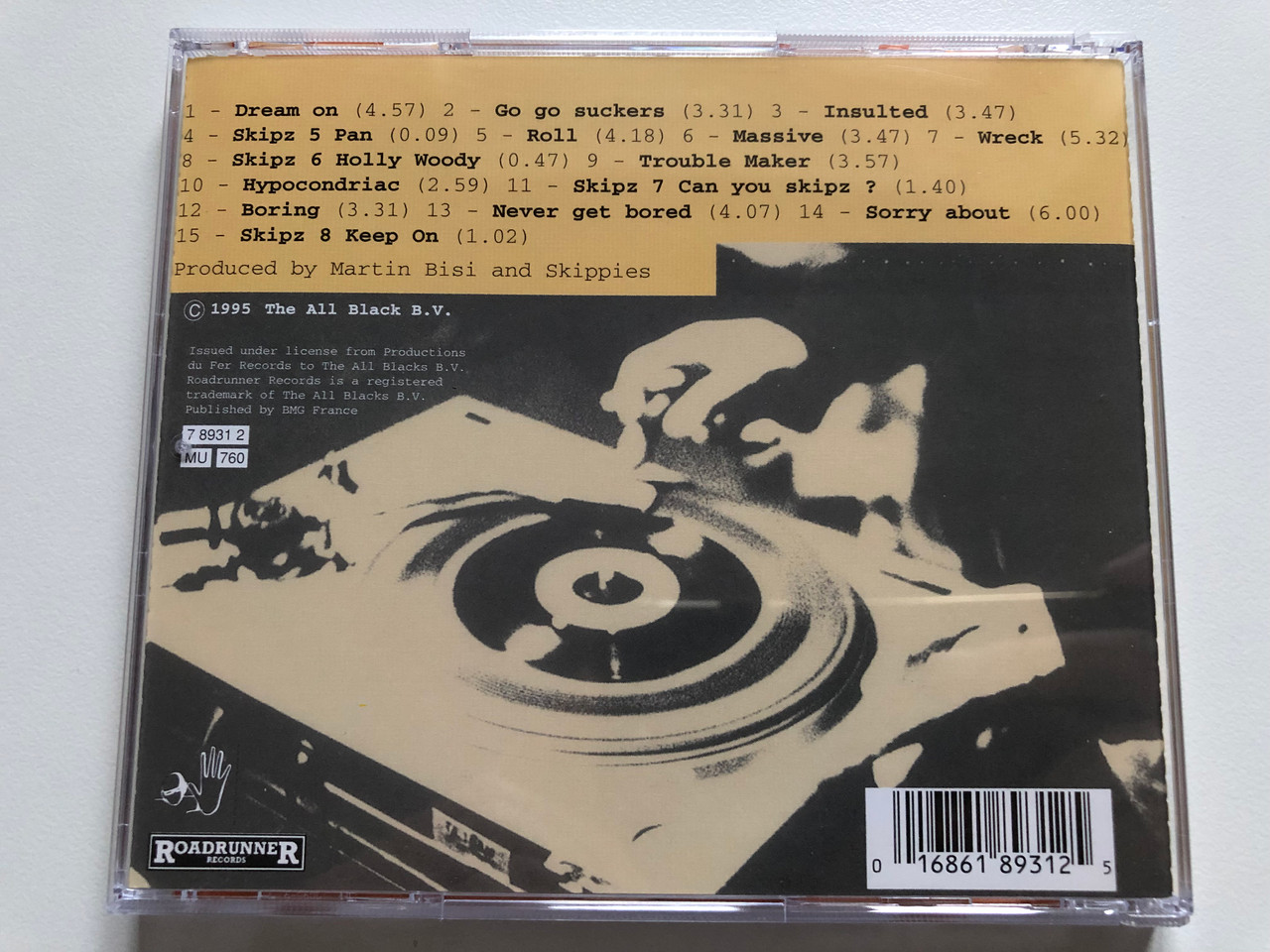 https://cdn10.bigcommerce.com/s-62bdpkt7pb/products/0/images/190272/Skippies_Massive_and_14_others_songs_Roadrunner_Records_Audio_CD_1995_RR_8931-2_7__40191.1630914820.1280.1280.JPG?c=2&_gl=1*jzi3dx*_ga*MjA2NTIxMjE2MC4xNTkwNTEyNTMy*_ga_WS2VZYPC6G*MTYzMDkwODcwOC42NS4xLjE2MzA5MTQ2OTMuMg..