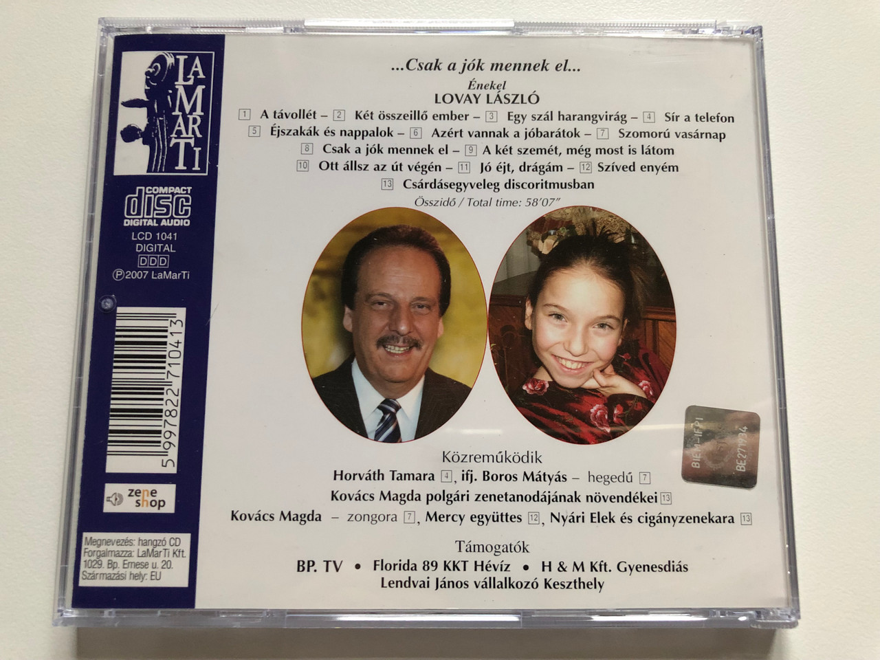 https://cdn10.bigcommerce.com/s-62bdpkt7pb/products/0/images/190301/...Csak_a_jok_mennek_el..._-_Lovay_Laszlo_enekel_LaMarTi_Audio_CD_2007_LCD_1041_5__05077.1630916576.1280.1280.JPG?c=2&_gl=1*f68mgf*_ga*MjA2NTIxMjE2MC4xNTkwNTEyNTMy*_ga_WS2VZYPC6G*MTYzMDkwODcwOC42NS4xLjE2MzA5MTYyNzUuMzI.