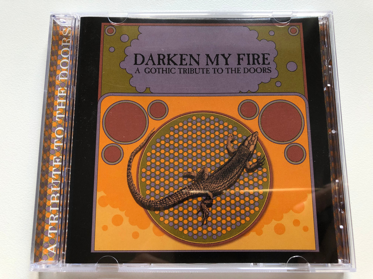 https://cdn10.bigcommerce.com/s-62bdpkt7pb/products/0/images/190483/Darken_My_Fire_-_A_Gothic_Tribute_To_The_Doors_Anagram_Records_Audio_CD_2000_CDMGRAM_129_1__49267.1631020613.1280.1280.JPG?c=2&_gl=1*107iadp*_ga*MjA2NTIxMjE2MC4xNTkwNTEyNTMy*_ga_WS2VZYPC6G*MTYzMTAxOTAzNi42OC4xLjE2MzEwMjA0MzAuMTg.