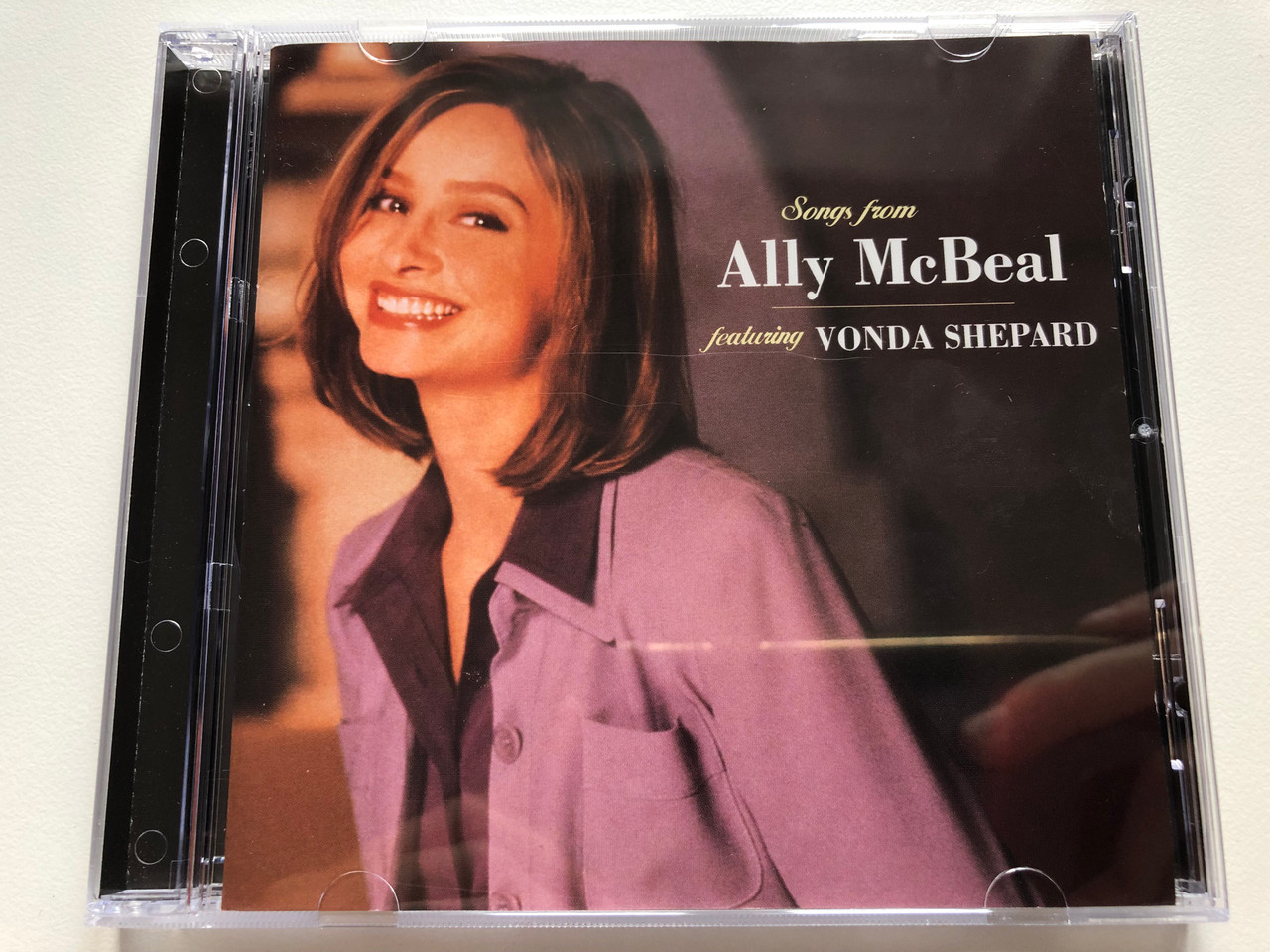 https://cdn10.bigcommerce.com/s-62bdpkt7pb/products/0/images/190510/Songs_From_Ally_McBeal_-_featuring_Vonda_Shepard_Epic_Audio_CD_1998_491124_2_1__47818.1631023616.1280.1280.JPG?c=2&_gl=1*ah9blj*_ga*MjA2NTIxMjE2MC4xNTkwNTEyNTMy*_ga_WS2VZYPC6G*MTYzMTAxOTAzNi42OC4xLjE2MzEwMjMwNjcuMjU.