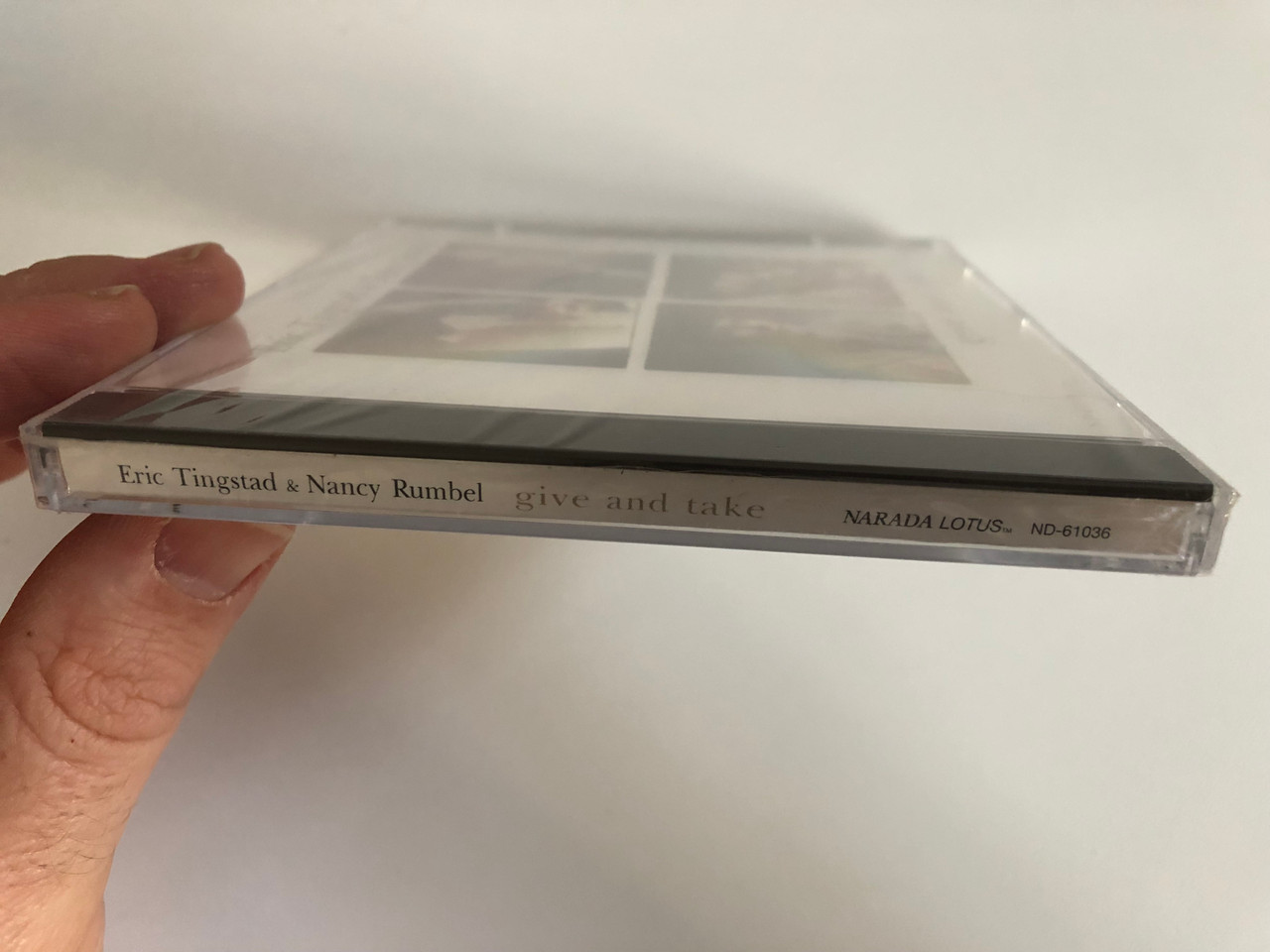 https://cdn10.bigcommerce.com/s-62bdpkt7pb/products/0/images/190728/Eric_Tingstad_Nancy_Rumbel_Give_And_Take_Narada_Lotus_Audio_CD_1993_ND-61036_3__68062.1631119381.1280.1280.JPG?c=2&_gl=1*peegob*_ga*MjA2NTIxMjE2MC4xNTkwNTEyNTMy*_ga_WS2VZYPC6G*MTYzMTEwOTIwNC43MS4xLjE2MzExMTkyOTguMjk.