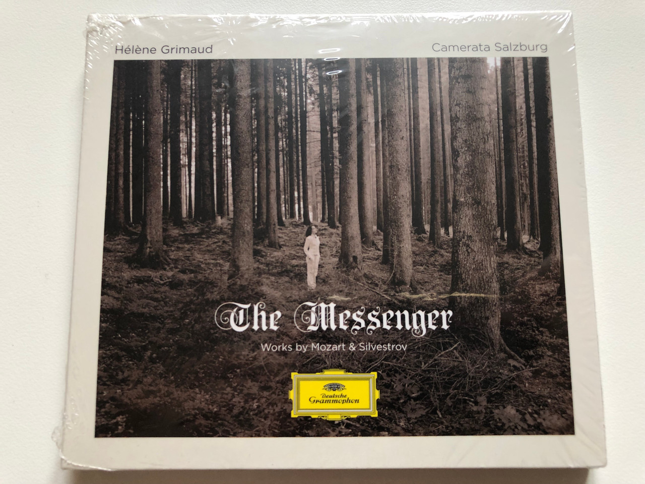 https://cdn10.bigcommerce.com/s-62bdpkt7pb/products/0/images/190981/Hlne_Grimaud_The_Messenger_Works_by_Mozart_Silvestrov_Deutsche_Grammophon_Audio_CD_2020_483_7853_1__85203.1631283486.1280.1280.JPG?c=2&_gl=1*wossj5*_ga*MjA2NTIxMjE2MC4xNTkwNTEyNTMy*_ga_WS2VZYPC6G*MTYzMTI3NzcwNy43NC4xLjE2MzEyODMxNDcuMTY.