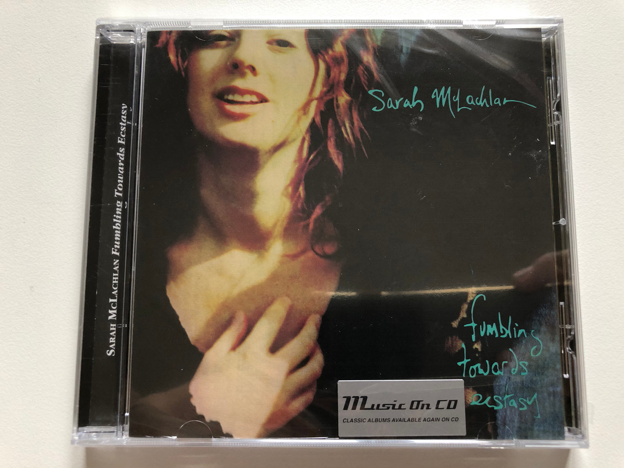 https://cdn10.bigcommerce.com/s-62bdpkt7pb/products/0/images/190990/Sarah_McLachlan_-_Fumbling_Towards_Ecstasy_Music_On_CD_Audio_CD_2020_MOCCD13982_1__13578.1631285473.1280.1280.JPG?c=2&_gl=1*1x9pauu*_ga*MjA2NTIxMjE2MC4xNTkwNTEyNTMy*_ga_WS2VZYPC6G*MTYzMTI3NzcwNy43NC4xLjE2MzEyODQ2NzcuNQ..