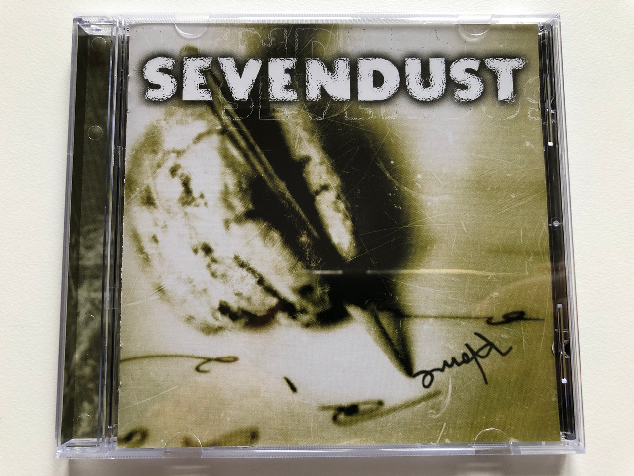 https://cdn10.bigcommerce.com/s-62bdpkt7pb/products/0/images/191073/Sevendust_Home_Epic_Audio_CD_1999_DRA_496137_2_1__90600.1631294511.1280.1280.JPG?c=2&_gl=1*1ywjf6w*_ga*MjA2NTIxMjE2MC4xNTkwNTEyNTMy*_ga_WS2VZYPC6G*MTYzMTI5MDYwOC43NS4xLjE2MzEyOTQyOTEuNTE.