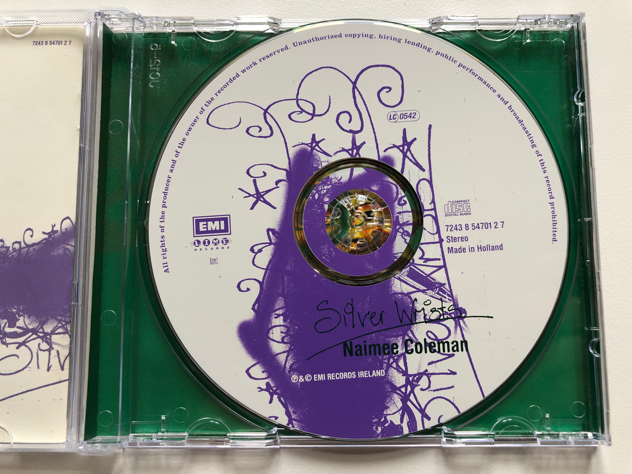 https://cdn10.bigcommerce.com/s-62bdpkt7pb/products/0/images/191156/Silver_Wrists_-_Naimee_Coleman_Lime_Records_Audio_CD_1996_Stereo_724385470127_3__78447.1631517333.1280.1280.JPG?c=2&_gl=1*17kn32i*_ga*MjA2NTIxMjE2MC4xNTkwNTEyNTMy*_ga_WS2VZYPC6G*MTYzMTUxNTA5OC43Ny4xLjE2MzE1MTcwNzQuMg..