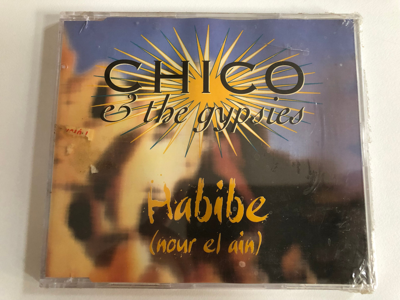 https://cdn10.bigcommerce.com/s-62bdpkt7pb/products/0/images/191274/Chico_The_Gypsies_Habibe_Nour_El_Ain_EMI_Electrola_Audio_CD_Stereo_7243-887686-2-7_1__19620.1631594989.1280.1280.JPG?c=2&_gl=1*1yuk9jz*_ga*MjA2NTIxMjE2MC4xNTkwNTEyNTMy*_ga_WS2VZYPC6G*MTYzMTU5NDA4MS43OS4xLjE2MzE1OTQ4MTguMw..