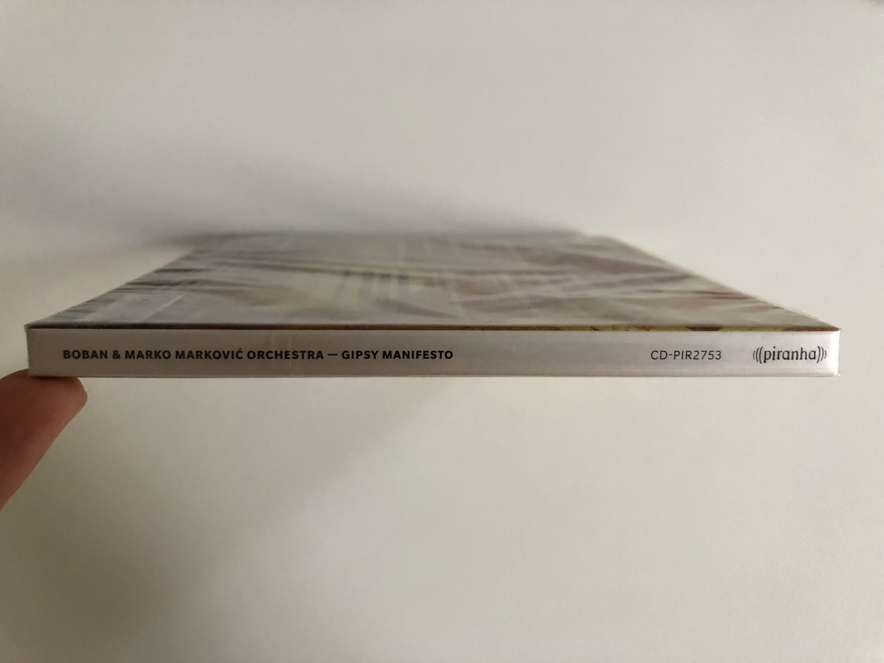 https://cdn10.bigcommerce.com/s-62bdpkt7pb/products/0/images/191603/Boban_Marko_Markovi_Orchestra_Gipsy_Manifesto_Piranha_Audio_CD_2013_CD-PIR2753_3__10700.1631795925.1280.1280.JPG?c=2&_gl=1*12wdbdg*_ga*MjA2NTIxMjE2MC4xNTkwNTEyNTMy*_ga_WS2VZYPC6G*MTYzMTc5MjEyNy44My4xLjE2MzE3OTU3NzUuNDE.