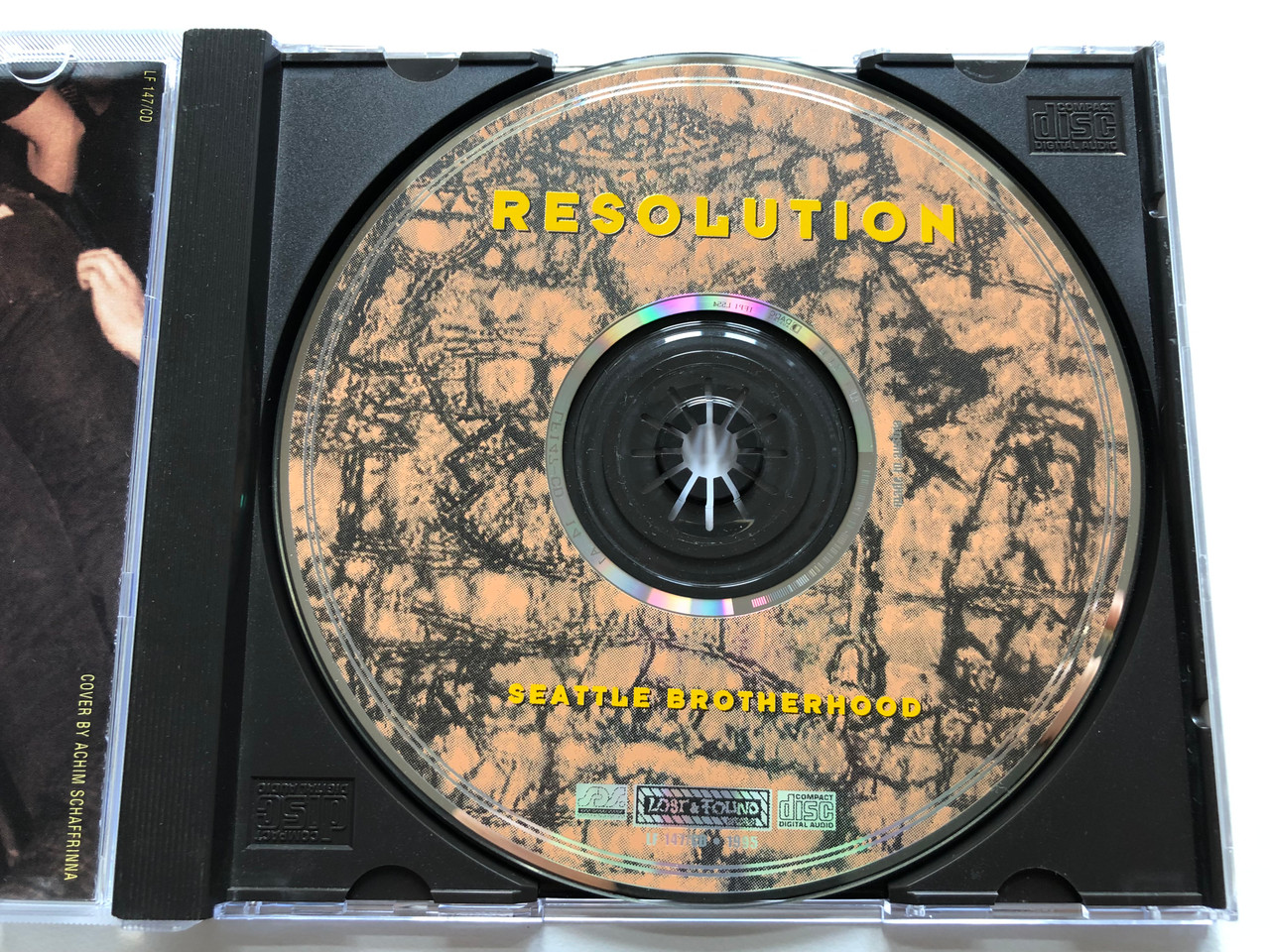 https://cdn10.bigcommerce.com/s-62bdpkt7pb/products/0/images/191705/Resolution_-_Seattle_Brotherhood_Lost_And_Found_Records_Audio_CD_1995_LF_147CD_3__86818.1631871853.1280.1280.JPG?c=2&_gl=1*775g5c*_ga*MjA2NTIxMjE2MC4xNTkwNTEyNTMy*_ga_WS2VZYPC6G*MTYzMTg3MDU0NC44NS4xLjE2MzE4NzE2MjMuMTk.
