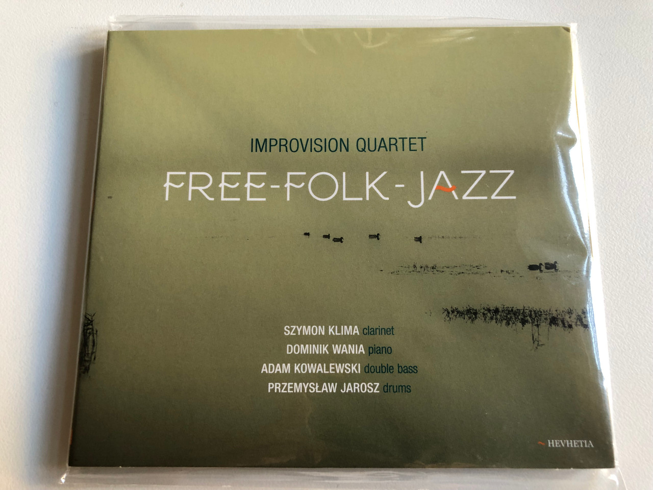 https://cdn10.bigcommerce.com/s-62bdpkt7pb/products/0/images/191751/Improvision_Quartet_Free-Folk-Jazz_Szymon_Klima_clarinet_Dominik_Wania_piano_Adam_Kowalewski_double_bass_Przemysaw_Jarosz_drums_Hevhetia_Audio_CD_2017_HV_0159-2-331_1__04804.1631882053.1280.1280.JPG?c=2&_gl=1*1xyvafz*_ga*MjA2NTIxMjE2MC4xNTkwNTEyNTMy*_ga_WS2VZYPC6G*MTYzMTg4MDI3MC44Ny4xLjE2MzE4ODE3MjguNTg.