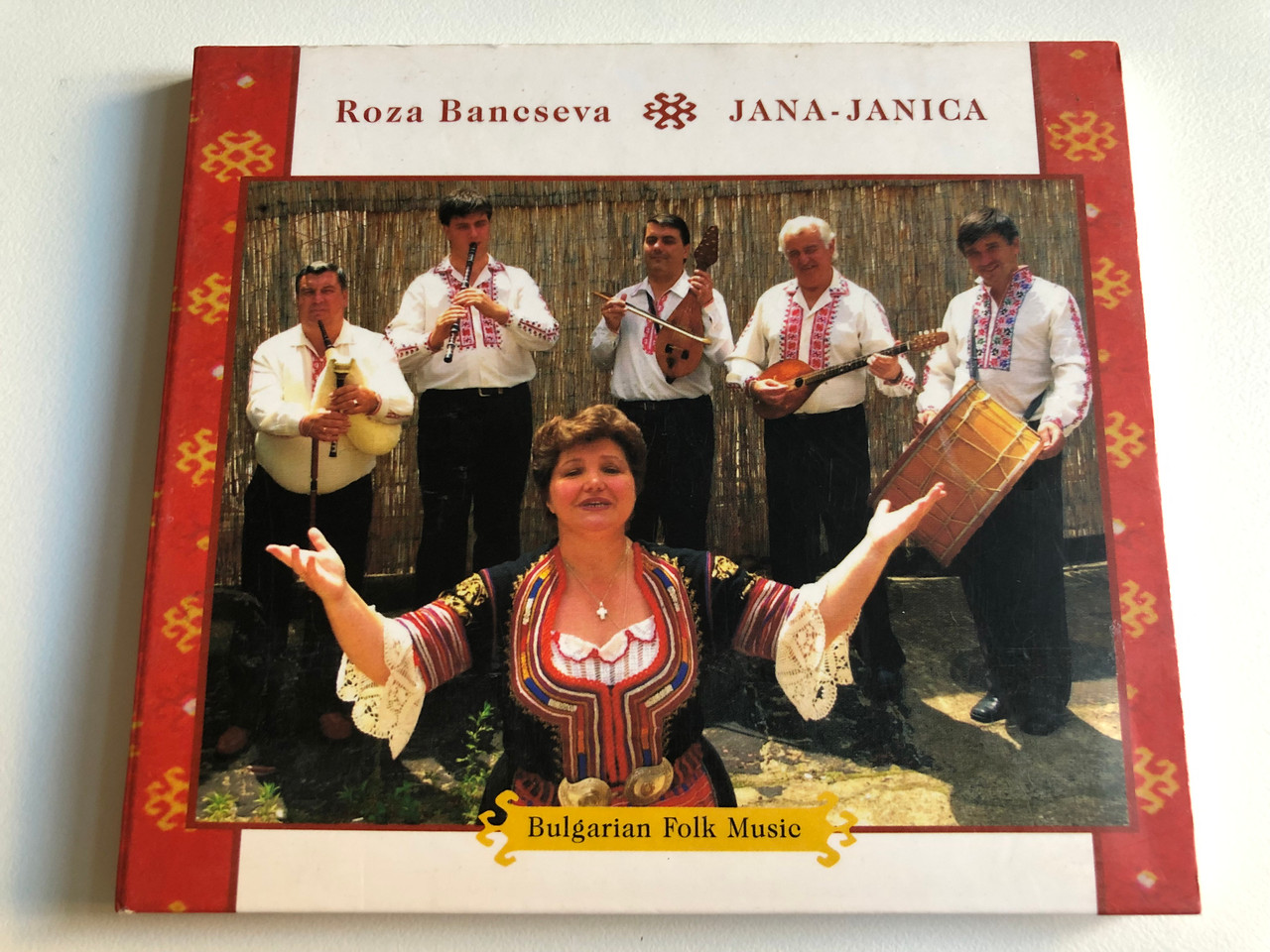 https://cdn10.bigcommerce.com/s-62bdpkt7pb/products/0/images/191857/Roza_Bancseva_Jana-Janica_-_Bulgarian_Folk_Music_Fon_Records_Audio_CD_2000_FA-083-2_1__82154.1631900172.1280.1280.JPG?c=2&_gl=1*1cadwlz*_ga*MjA2NTIxMjE2MC4xNTkwNTEyNTMy*_ga_WS2VZYPC6G*MTYzMTg5Nzc3MC44OC4xLjE2MzE5MDAwNzUuNjA.