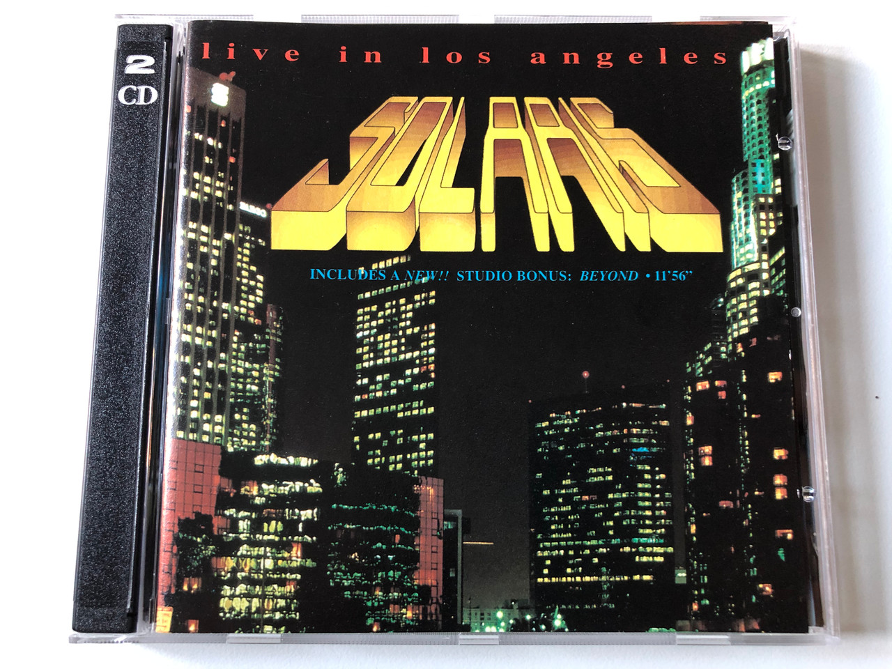 https://cdn10.bigcommerce.com/s-62bdpkt7pb/products/0/images/191913/Solaris_Live_In_Los_Angeles_Includes_A_New_Studio_Bonus_Beyond_-_1156_Solaris_Music_Productions_2x_Audio_CD_1996_SMP_004_1__39847.1632113115.1280.1280.JPG?c=2&_gl=1*10o4hxc*_ga*MjA2NTIxMjE2MC4xNTkwNTEyNTMy*_ga_WS2VZYPC6G*MTYzMjExMDczNi44OS4xLjE2MzIxMTI4NTkuMTc.