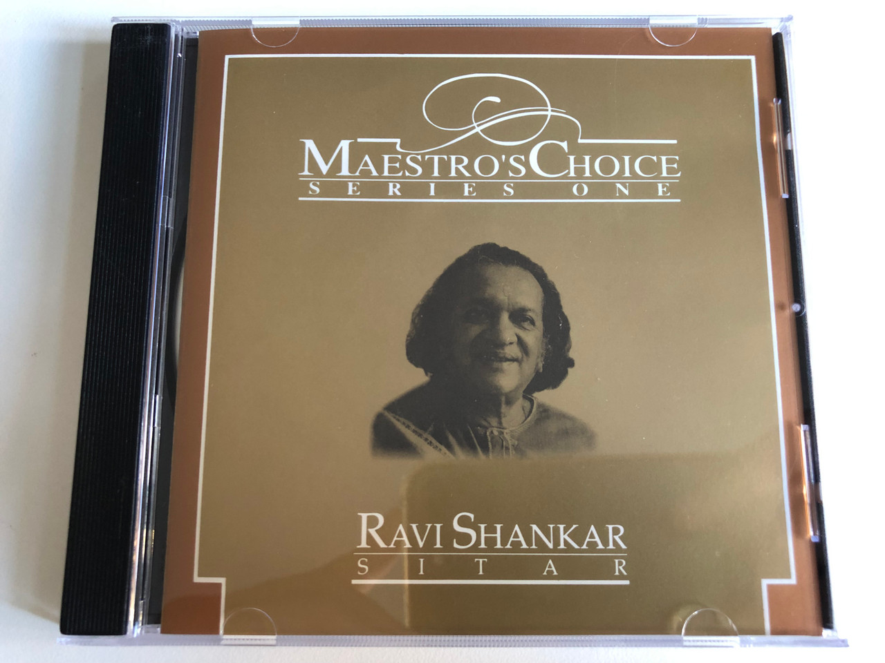 https://cdn10.bigcommerce.com/s-62bdpkt7pb/products/0/images/192080/Ravi_Shankar_Maestros_Choice_-_Series_One_Music_Today_Audio_CD_1991_CD_A-91003_1__99565.1632142935.1280.1280.JPG?c=2&_gl=1*1powy7u*_ga*MjA2NTIxMjE2MC4xNTkwNTEyNTMy*_ga_WS2VZYPC6G*MTYzMjE0MTc2Ni45MS4xLjE2MzIxNDI3NTQuNDE.