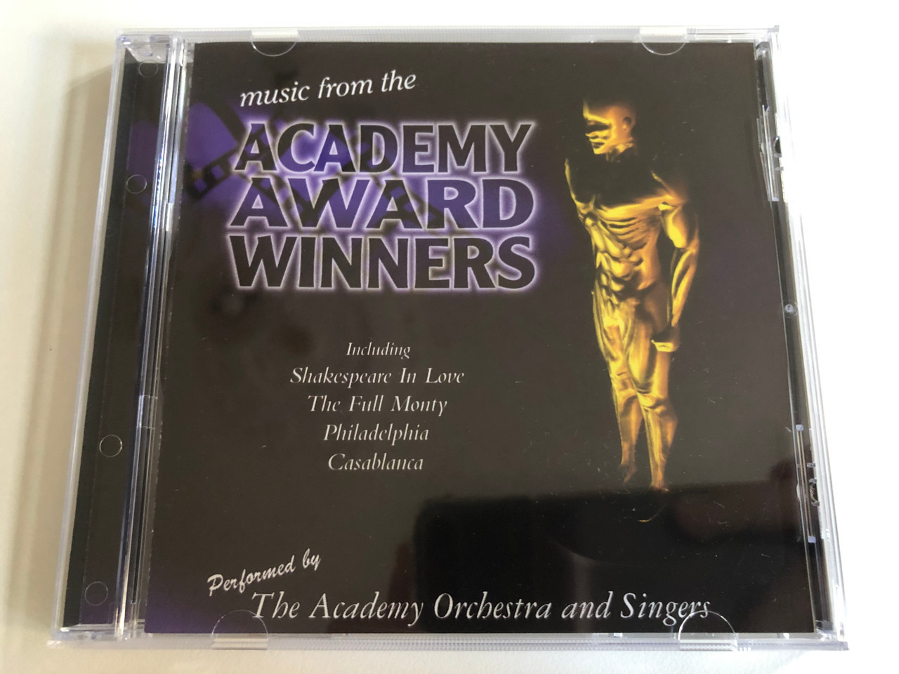 https://cdn10.bigcommerce.com/s-62bdpkt7pb/products/0/images/192466/Music_From_The_Academy_Award_Winners_Including_Shakespeare_In_Love_The_Full_Monty_Philadelphia_Casablanca_Performed_byThe_Academy_Orchestra_And_Singers_Cosmopolitan_Audio_CD_2000_405_1__27198.1632294365.1280.1280.JPG?c=2&_gl=1*1t6l82s*_ga*MjA2NTIxMjE2MC4xNTkwNTEyNTMy*_ga_WS2VZYPC6G*MTYzMjI4NzA1MS45NS4xLjE2MzIyOTM2ODAuNDQ.