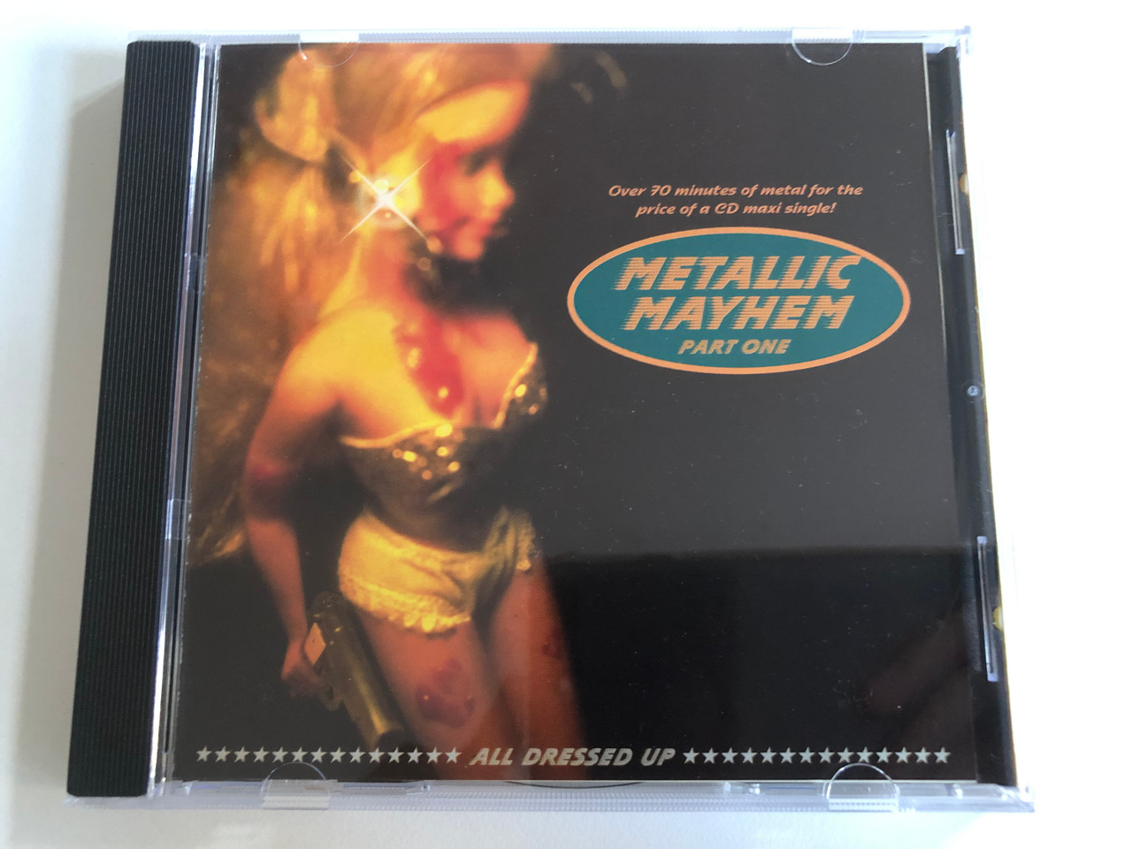https://cdn10.bigcommerce.com/s-62bdpkt7pb/products/0/images/192479/Metallic_Mayhem_-_Part_One_Over_70_minutes_of_metal_for_the_price_of_a_CD_maxi_single_Megarock_Records_Audio_CD_1995_MRRCD025_1__71878.1632297085.1280.1280.JPG?c=2&_gl=1*1j8smuw*_ga*MjA2NTIxMjE2MC4xNTkwNTEyNTMy*_ga_WS2VZYPC6G*MTYzMjI4NzA1MS45NS4xLjE2MzIyOTY2MTkuNTY.