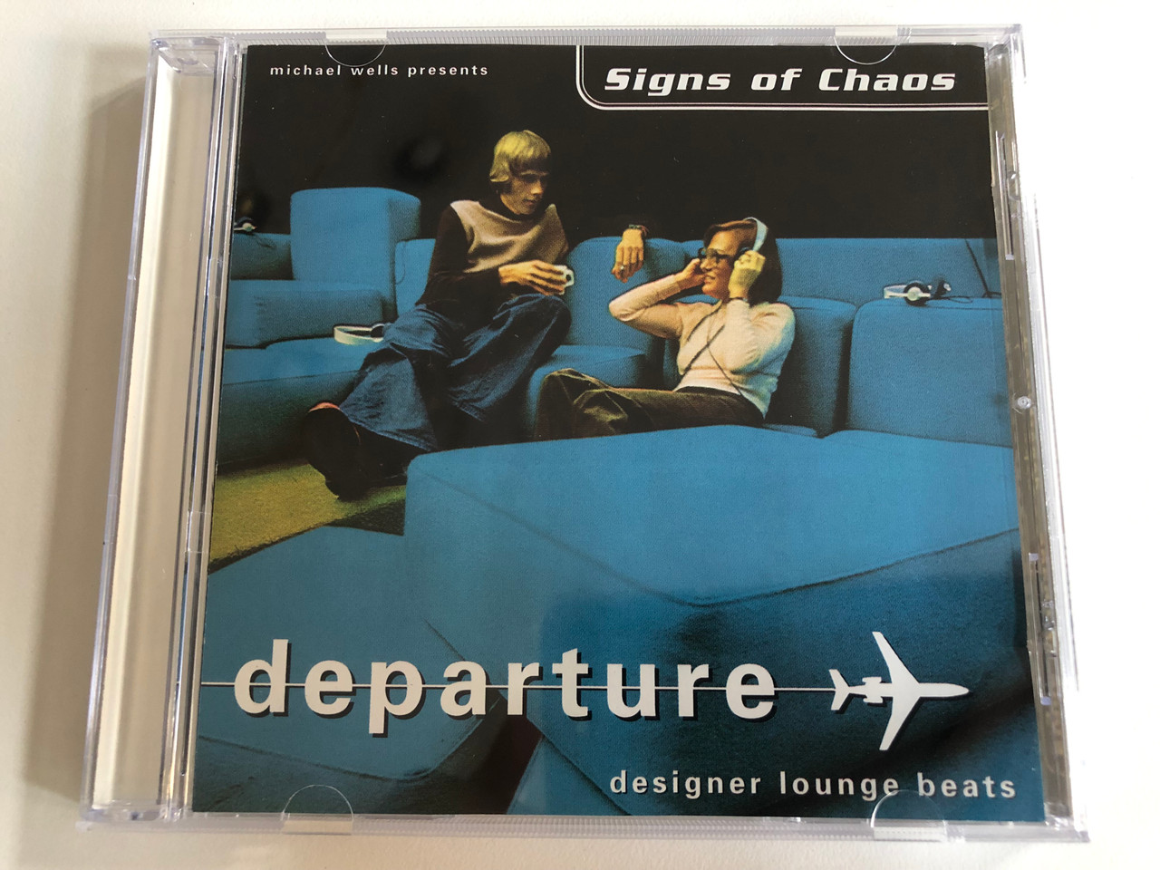 https://cdn10.bigcommerce.com/s-62bdpkt7pb/products/0/images/192513/Michael_Wells_presents_Signs_Of_Chaos_Departure_-_Designer_Lounge_Beats_Medcom_Audio_CD_1988_RR_8719_2_1__22435.1632301880.1280.1280.JPG?c=2&_gl=1*3top0t*_ga*MjA2NTIxMjE2MC4xNTkwNTEyNTMy*_ga_WS2VZYPC6G*MTYzMjI4NzA1MS45NS4xLjE2MzIzMDE3NDguNjA.