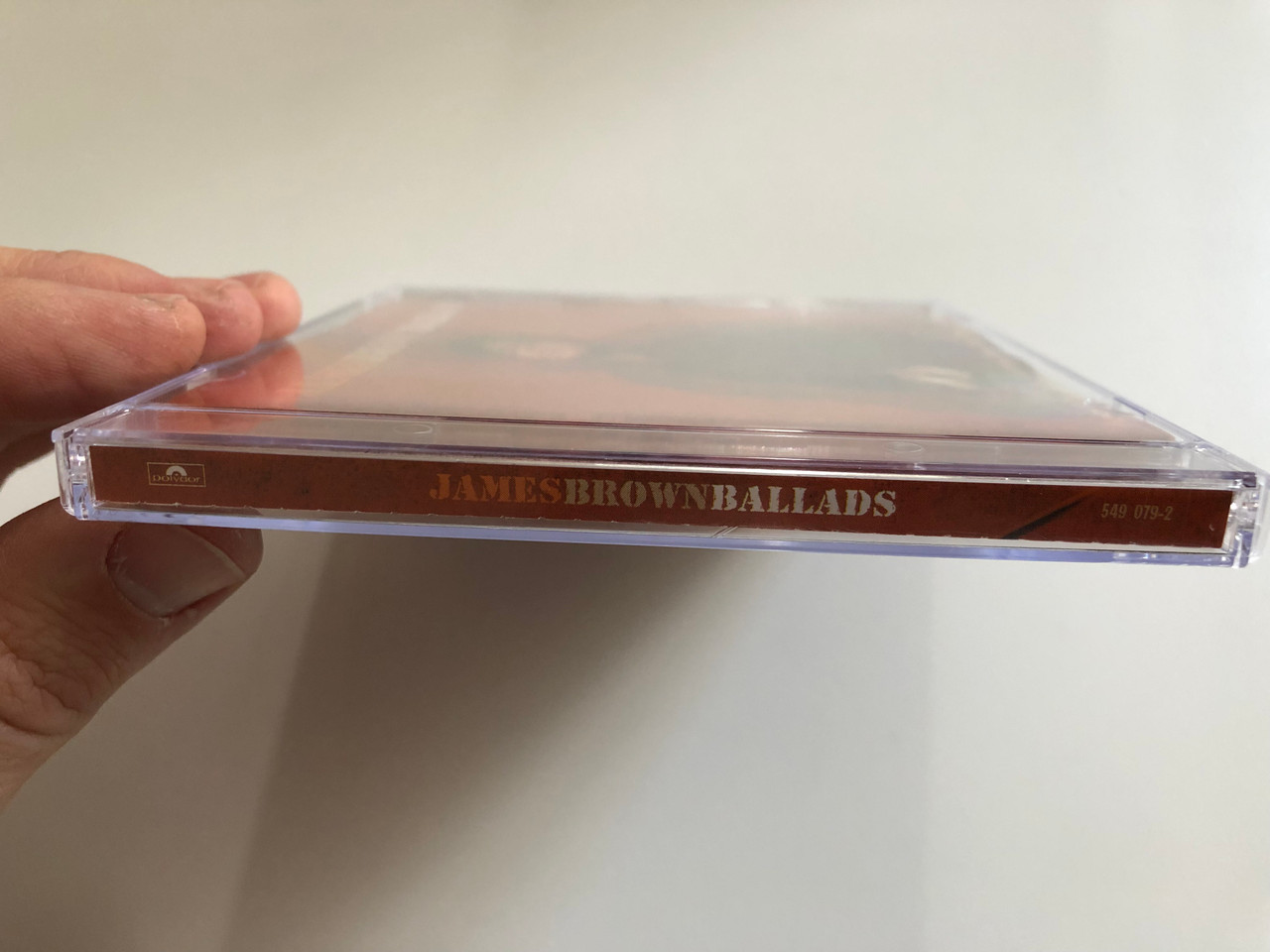 https://cdn10.bigcommerce.com/s-62bdpkt7pb/products/0/images/192699/James_Brown_Ballads_Prisoner_Of_Love_Try_Me_Its_A_Mans_Mans_Mans_World_I_Cried_and_more_Polydor_Audio_CD_2000_549_079-2_3__16466.1632461707.1280.1280.JPG?c=2&_gl=1*ecviyd*_ga*MjA2NTIxMjE2MC4xNTkwNTEyNTMy*_ga_WS2VZYPC6G*MTYzMjQ2MDk1NC45Ny4xLjE2MzI0NjE0NTUuNg..