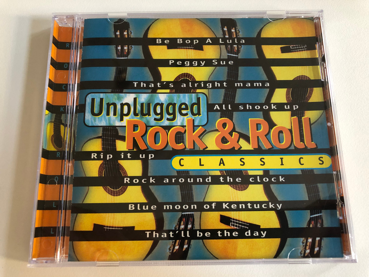 https://cdn10.bigcommerce.com/s-62bdpkt7pb/products/0/images/192906/Unplugged_Rock_Roll_Classics_Be_Bop_A_Lula_Peggy_Sue_Thats_Alright_Mama_All_Shook_Up_Rip_It_Up_Rock_Around_The_Clock_Blue_Moon_Of_Kentucky_Thatll_Be_The_Day_Wise_Buy_Audio_CD_19_1__72626.1632733511.1280.1280.JPG?c=2&_gl=1*1yidnf1*_ga*MjA2NTIxMjE2MC4xNTkwNTEyNTMy*_ga_WS2VZYPC6G*MTYzMjczMzIxOC45OS4wLjE2MzI3MzMyMTguNjA.