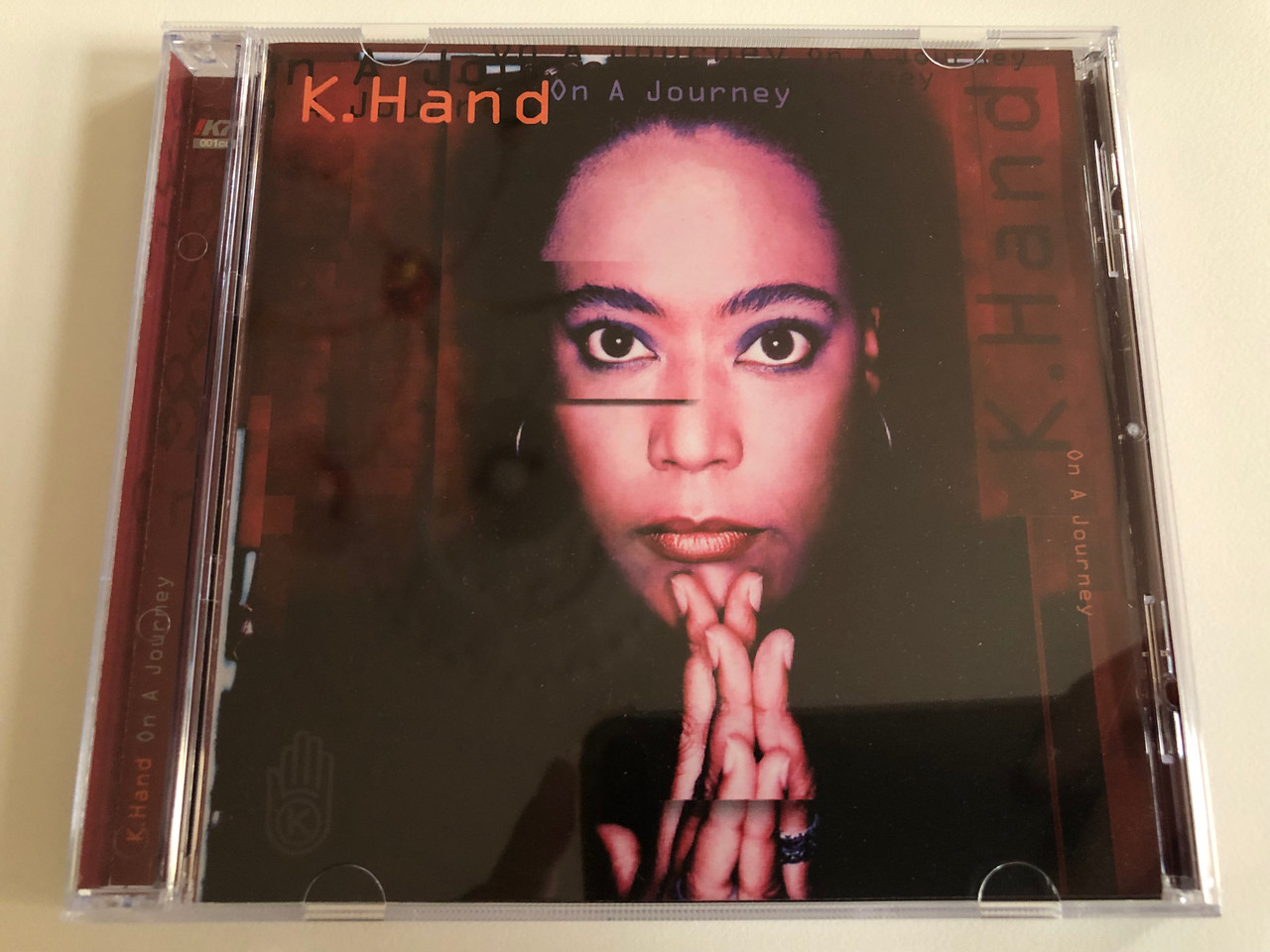 https://cdn10.bigcommerce.com/s-62bdpkt7pb/products/0/images/192941/K._Hand_On_A_Journey_K7_Records_Audio_CD_1996_K7R001cd_1__94358.1632735167.1280.1280.JPG?c=2&_gl=1*16bex82*_ga*MjA2NTIxMjE2MC4xNTkwNTEyNTMy*_ga_WS2VZYPC6G*MTYzMjczMzIxOC45OS4xLjE2MzI3MzUwMjIuNTI.
