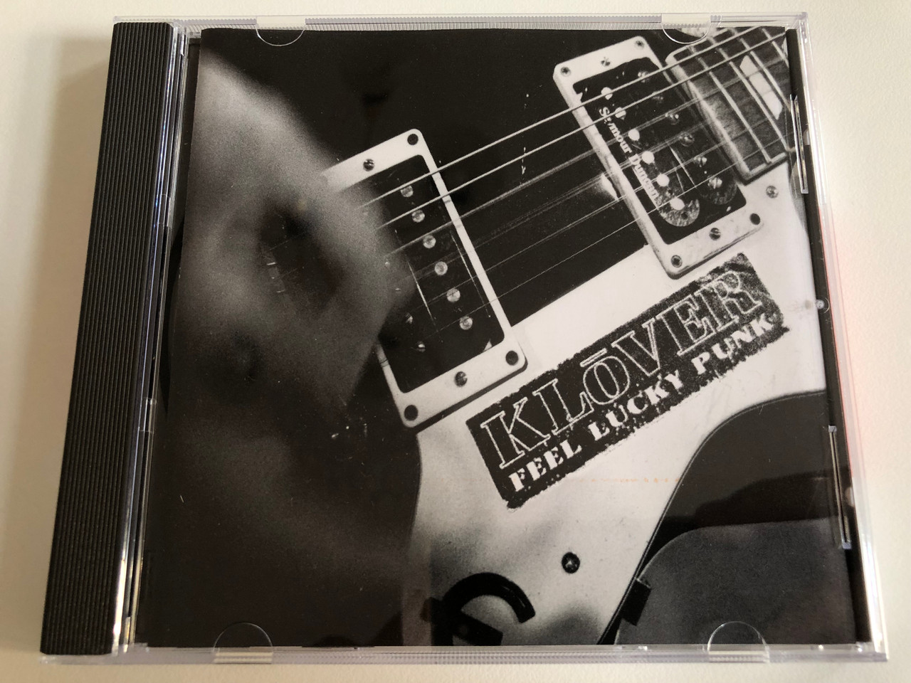 https://cdn10.bigcommerce.com/s-62bdpkt7pb/products/0/images/193052/Klover_Feel_Lucky_Punk_Mercury_Audio_CD_1995_526_813-2_1__47580.1632757418.1280.1280.JPG?c=2&_gl=1*g4xhpr*_ga*MjA2NTIxMjE2MC4xNTkwNTEyNTMy*_ga_WS2VZYPC6G*MTYzMjc1MzgwNy4xMDAuMS4xNjMyNzU3Mjc4LjUw