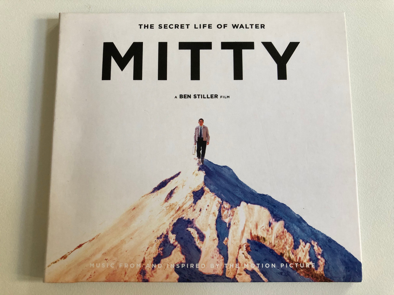 https://cdn10.bigcommerce.com/s-62bdpkt7pb/products/0/images/193081/The_Secret_Life_Of_Walter_Mitty_-_A_Ben_Stiller_Film_Music_From_And_Inspired_By_The_Motion_Picture_Republic_Records_Audio_CD_2013_602537661138_1__41727.1632814819.1280.1280.JPG?c=2&_gl=1*1sikr9v*_ga*MjA2NTIxMjE2MC4xNTkwNTEyNTMy*_ga_WS2VZYPC6G*MTYzMjgxMzEwMC4xMDEuMS4xNjMyODE0NjUwLjQz
