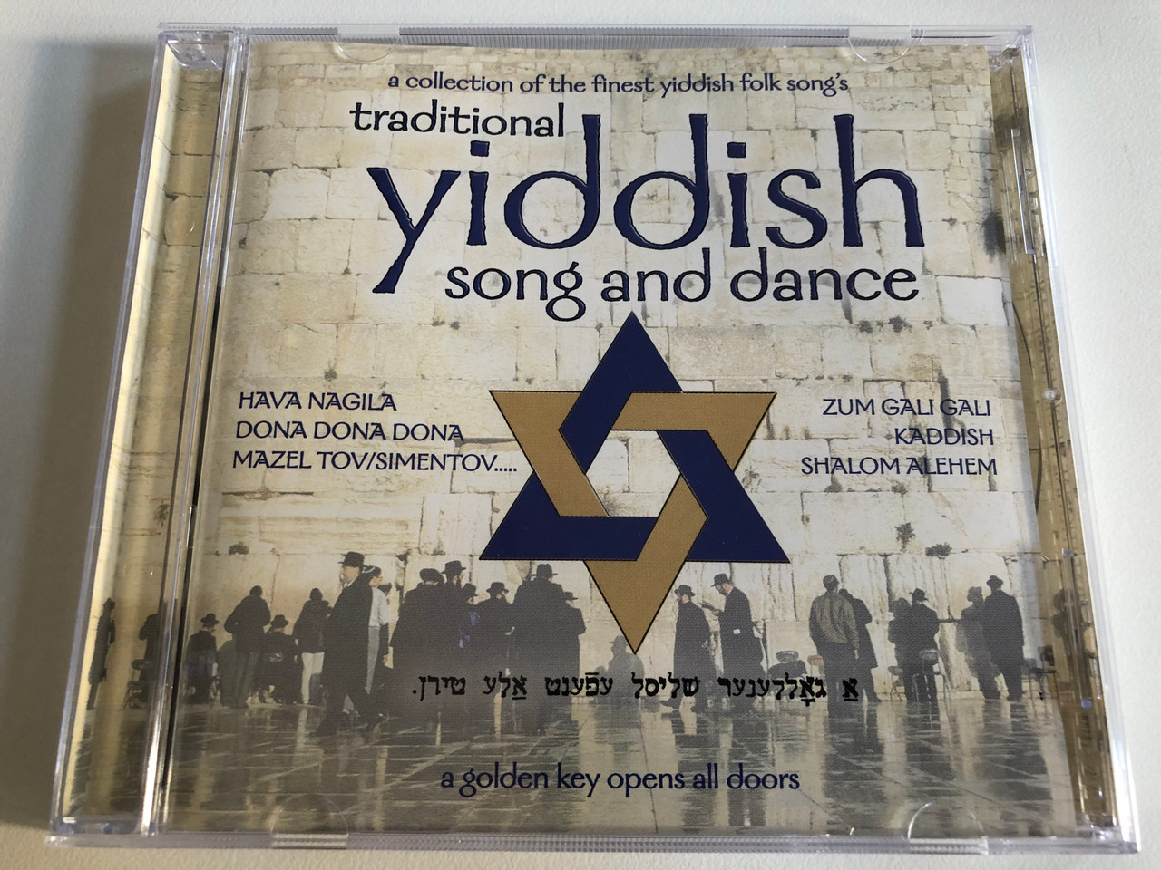 https://cdn10.bigcommerce.com/s-62bdpkt7pb/products/0/images/193302/Traditional_Yiddish_Song_And_Dance_a_collection_of_the_finest_yiddish_folk_songs_Hava_Nagila_Dona_Dona_Dona_Mazel_TovSimentov_Zum_Gali_Gali_Kaddish_Shalom_Alehem..._E2_Audio_CD_19_1__63910.1632911157.1280.1280.JPG?c=2&_gl=1*1uugrna*_ga*MjA2NTIxMjE2MC4xNTkwNTEyNTMy*_ga_WS2VZYPC6G*MTYzMjkxMDc5Mi4xMDMuMC4xNjMyOTEwNzkyLjYw