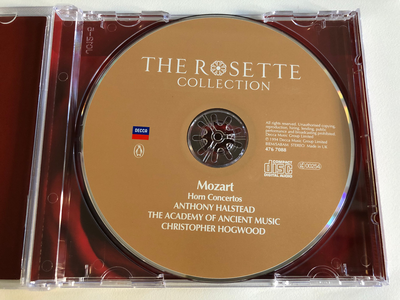 https://cdn10.bigcommerce.com/s-62bdpkt7pb/products/0/images/193379/The_Rosette_Collection_Mozart_The_Horn_Concertos_Anthony_Halstead_The_Academy_Of_Ancient_Music_Christopher_Hogwood_A_Rosette_Recording_-_The_Penguin_Guide_To_Compact_Discs_Decca_Audi_3__90708.1632932927.1280.1280.JPG?c=2&_gl=1*kkd3ev*_ga*MjA2NTIxMjE2MC4xNTkwNTEyNTMy*_ga_WS2VZYPC6G*MTYzMjkyODkwMC4xMDQuMS4xNjMyOTMyODk1LjYw
