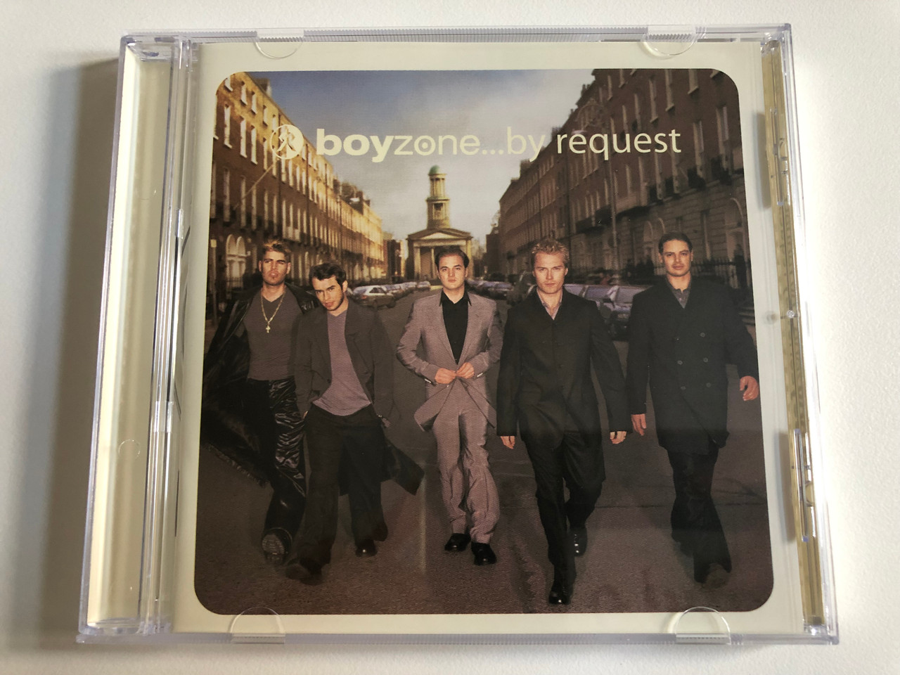 https://cdn10.bigcommerce.com/s-62bdpkt7pb/products/0/images/193767/Boyzone_...By_Request_Polydor_Audio_CD_1999_547_404-2_1__04377.1633100284.1280.1280.JPG?c=2&_gl=1*eyy0k5*_ga*MjA2NTIxMjE2MC4xNTkwNTEyNTMy*_ga_WS2VZYPC6G*MTYzMzA5ODY0Mi4xMTAuMS4xNjMzMTAwMTA0LjQ4